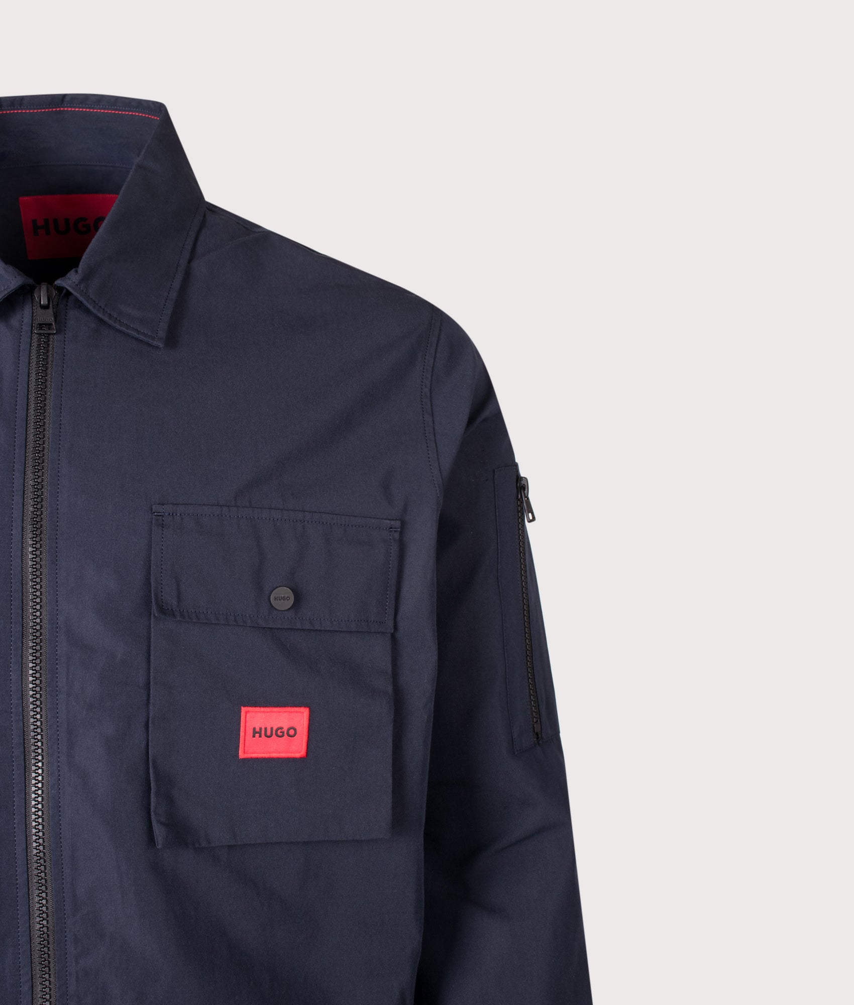 HUGO Relaxed Fit Emmond Zip Through Overshirt in Dark Blue at EQVVS Menswear. Detail shot.