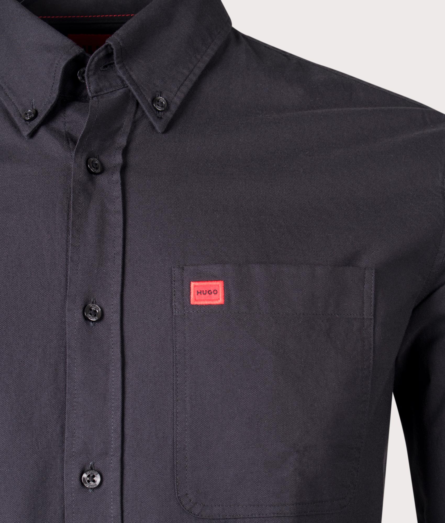 HUGO Slim Fit Evito Oxford Shirt in Black, 100% Cotton. At EQVVS Menswear. Front logo shot