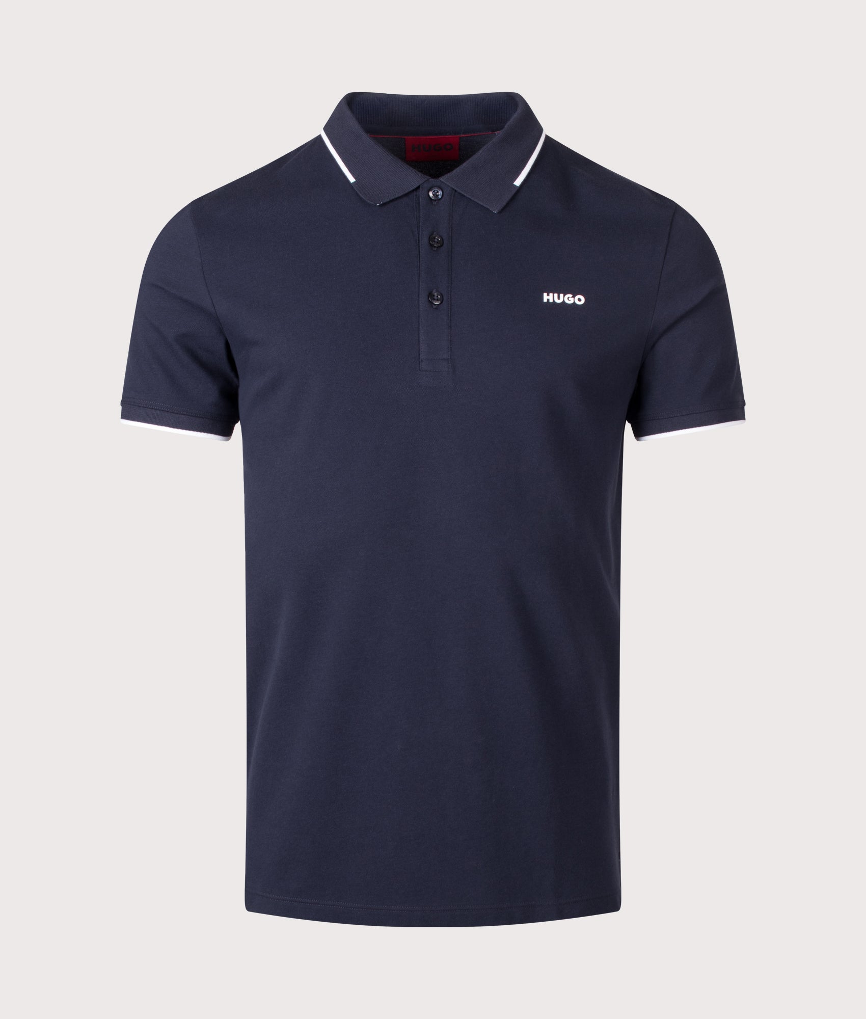 HUGO Slim Fit Dinoso222 Polo Shirt in Dark Blue at EQVVS Menswear. Front shot.