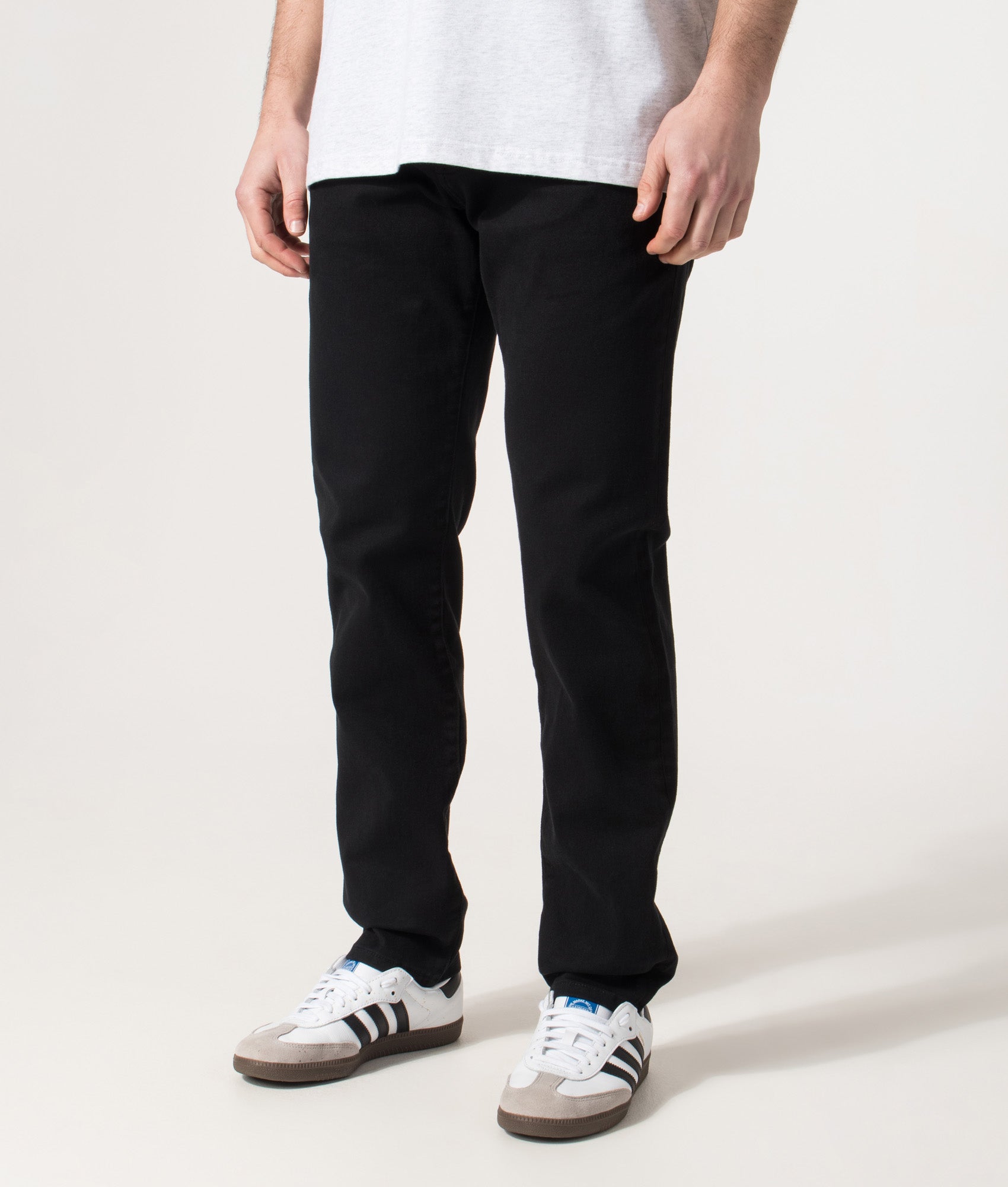 BOSS Regular Fit Maine BC-C Jeans in Black at EQVVS Menswear.  Front angle model shot 
