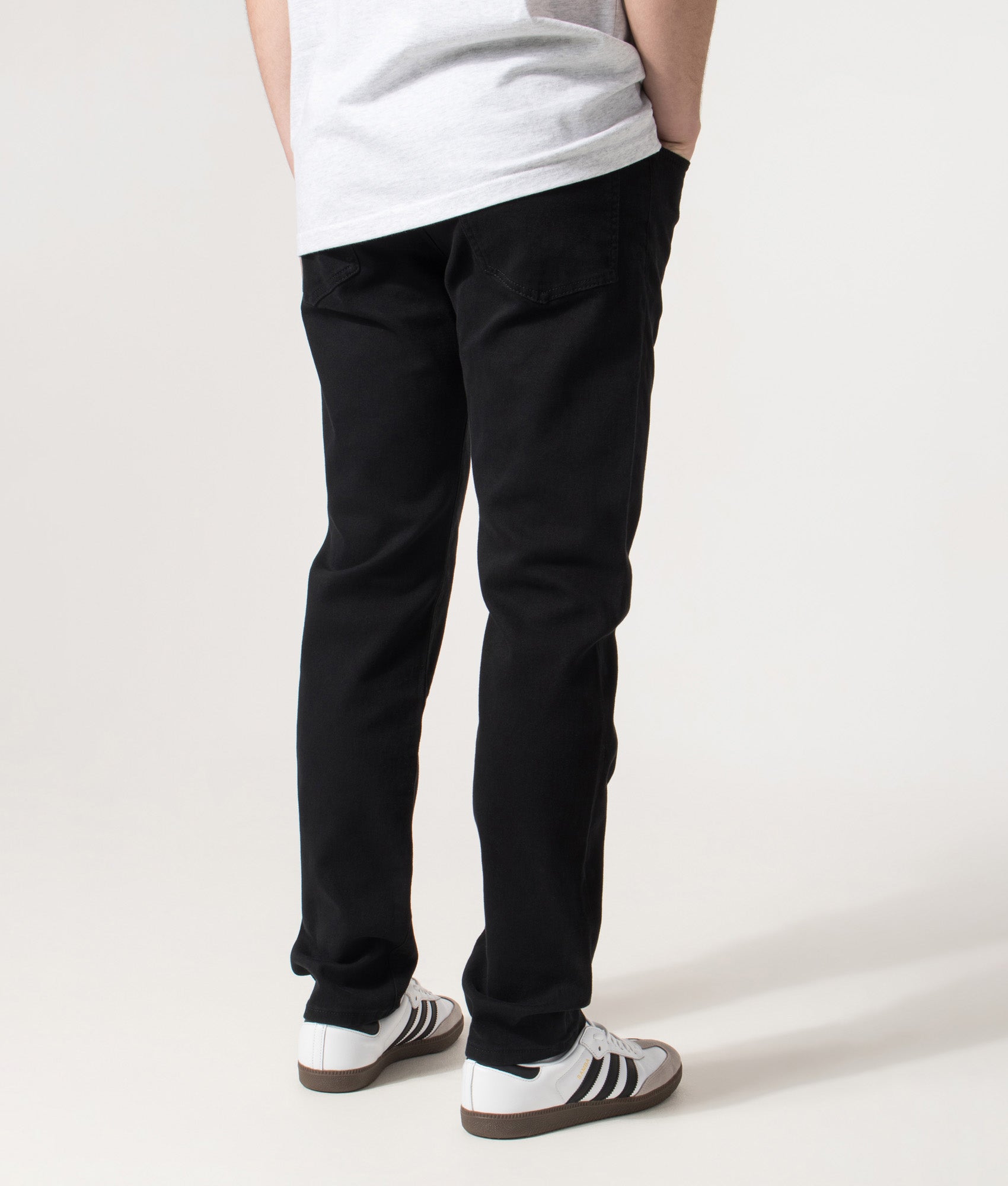 BOSS Regular Fit Maine BC-C Jeans in Black at EQVVS Menswear.  Back angle model shot 