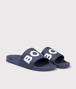 BOSS Aryeh Sliders in Dark Blue. Front angle shot at EQVVS.