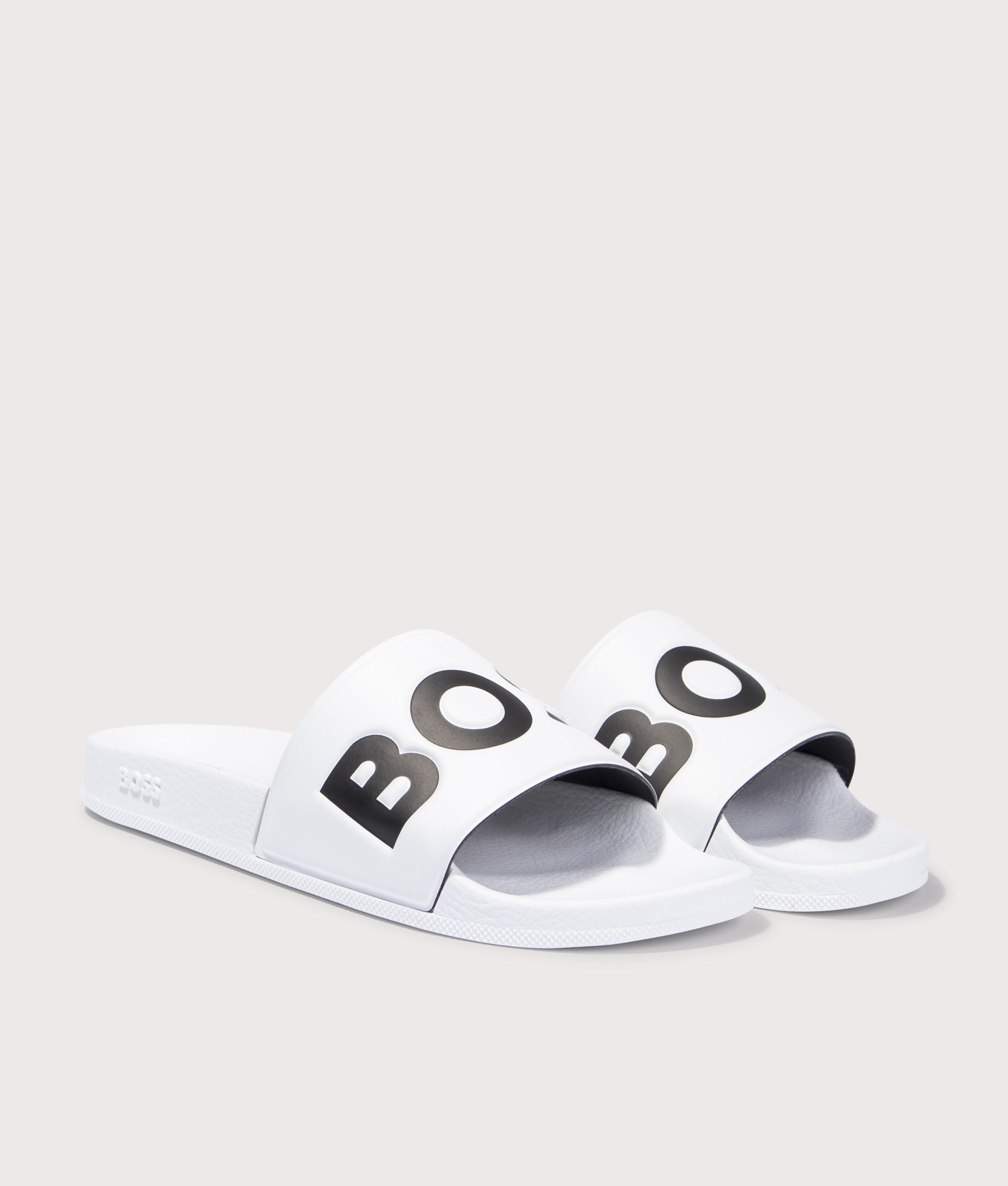 BOSS Aryeh Sliders in Natural. Front angle shot at EQVVS.