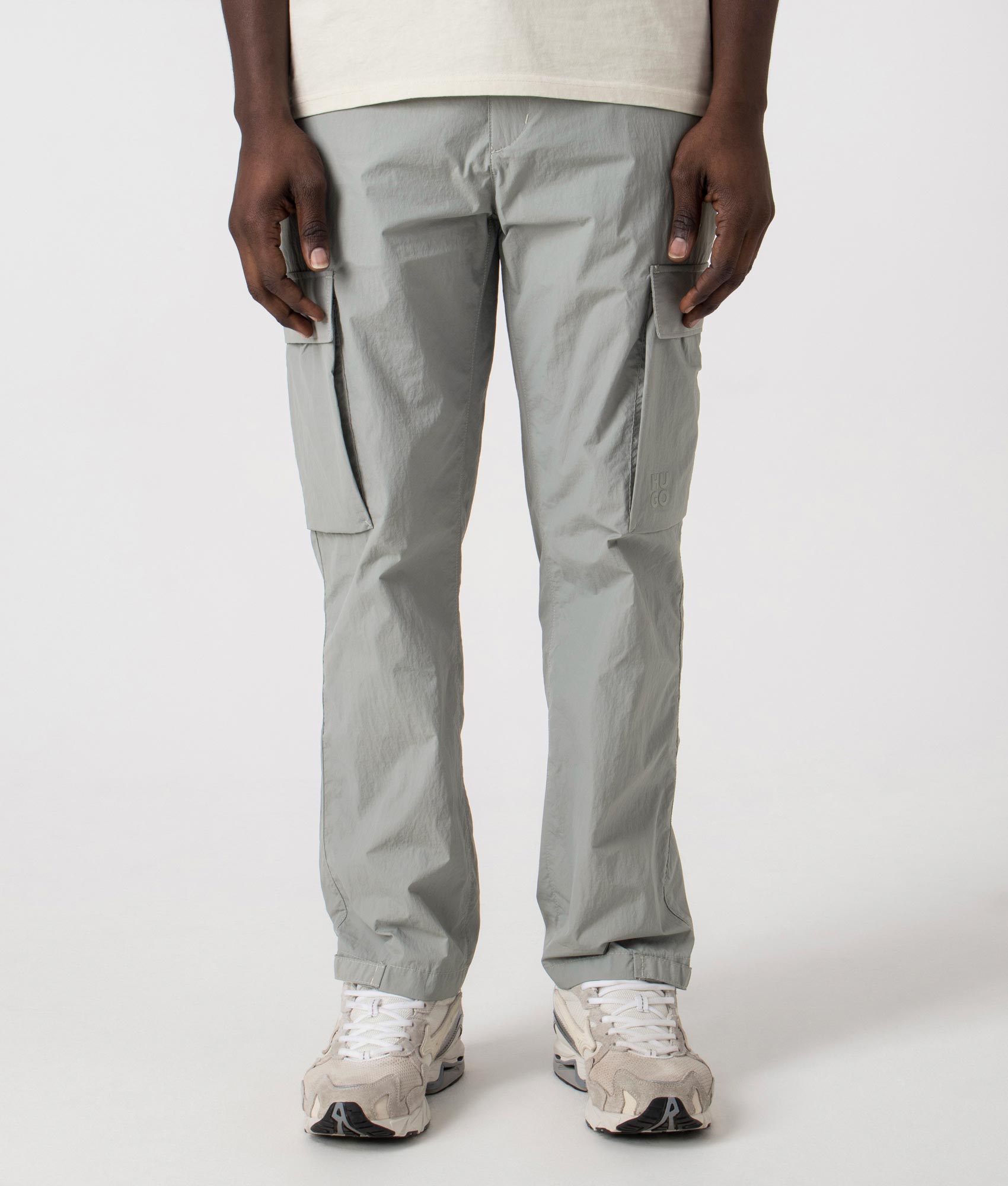 Gero241 Cargo Pants in Medium Grey by Hugo. EQVVS Front Angle Shot.