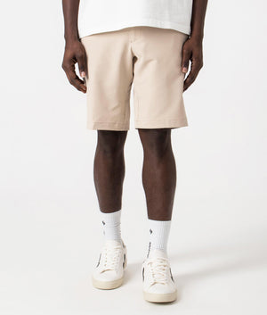 BOSS Slim Fit Commuter Chinos in Medium beige. Front angle shot at EQVVS.