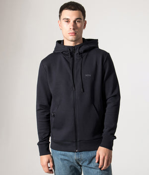 BOSS Zip Through Saggy Hoodie in Dark Blue at EQVVS Menswear. Model front shot.