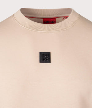 Relaxed Fit Dettil Sweatshirt in Medium Beige | HUGO | EQVVS logo shot