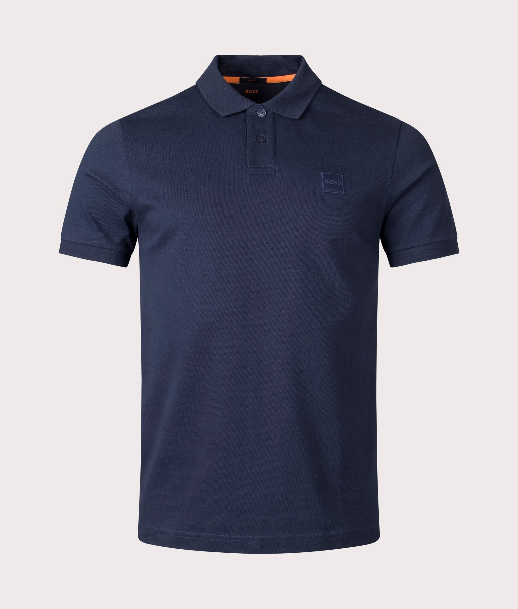 Boss Slim Fit Passenger Polo Shirt in Dark Blue at EQVVS Menswear. Front shot.