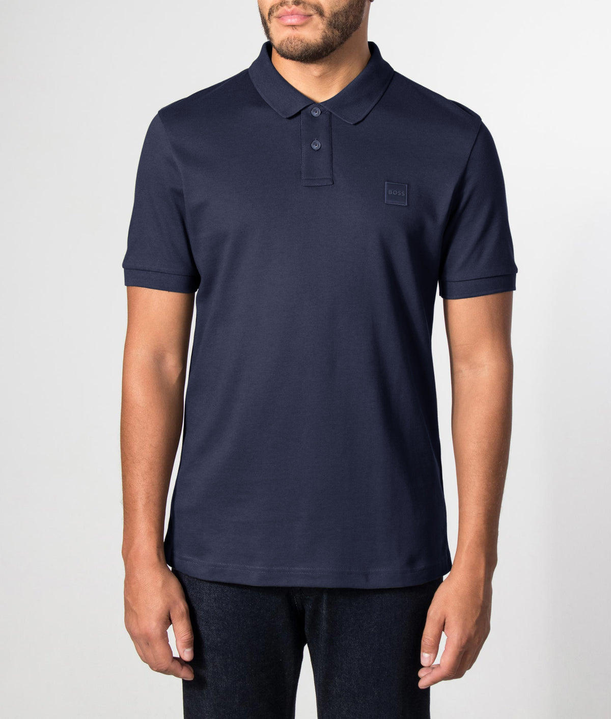 BOSS Slim Fit Passenger Polo Shirt in Dark Blue. Front model shot EQVVS