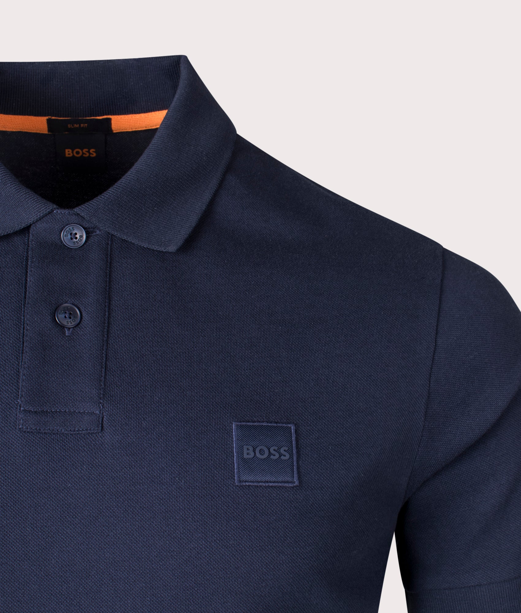 Boss Slim Fit Passenger Polo Shirt in Dark Blue at EQVVS Menswear. Detail shot.