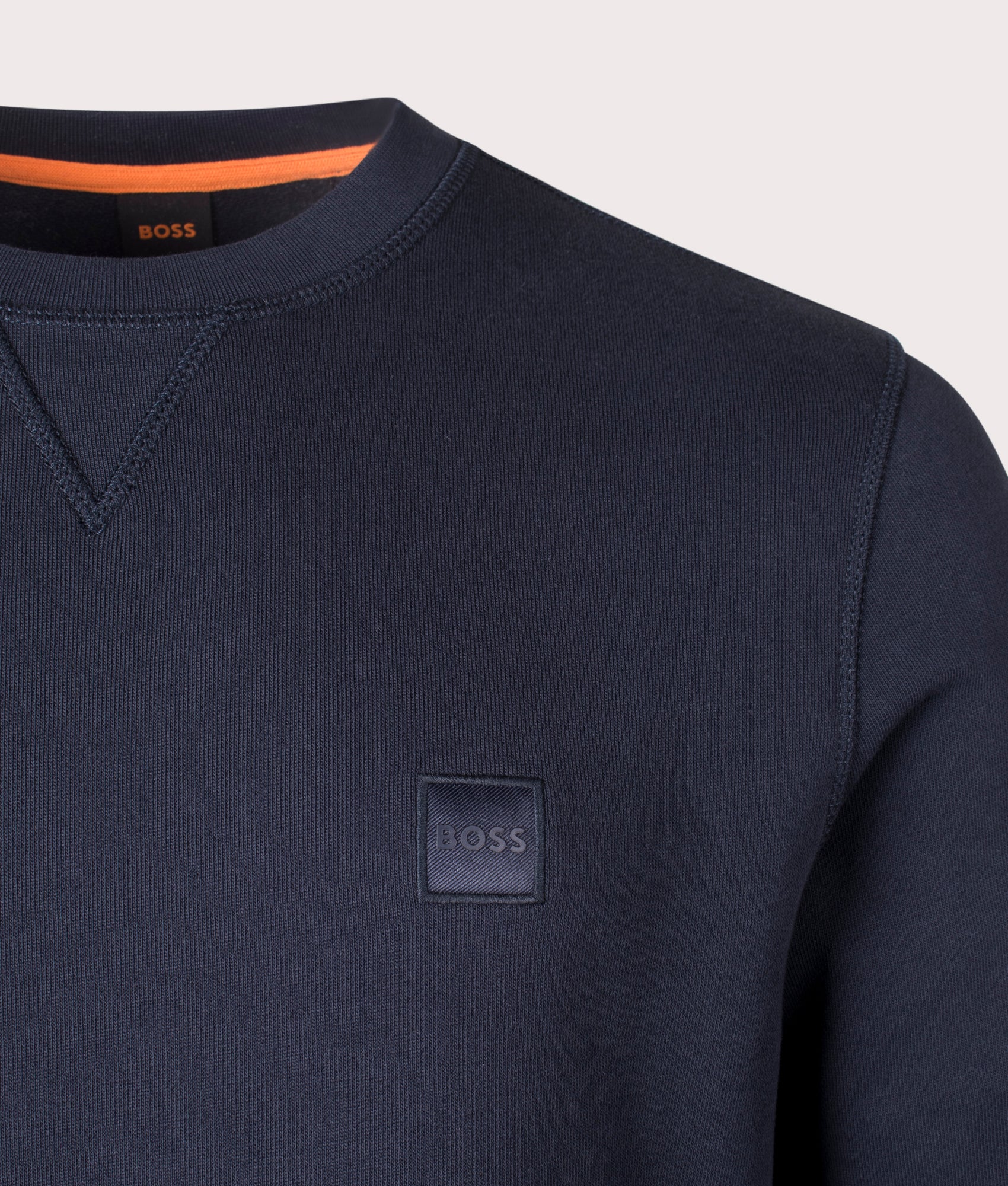 BOSS Relaxed Fit Westart Sweatshirt in Dark Blue at EQVVS Menswear. Detail shot.