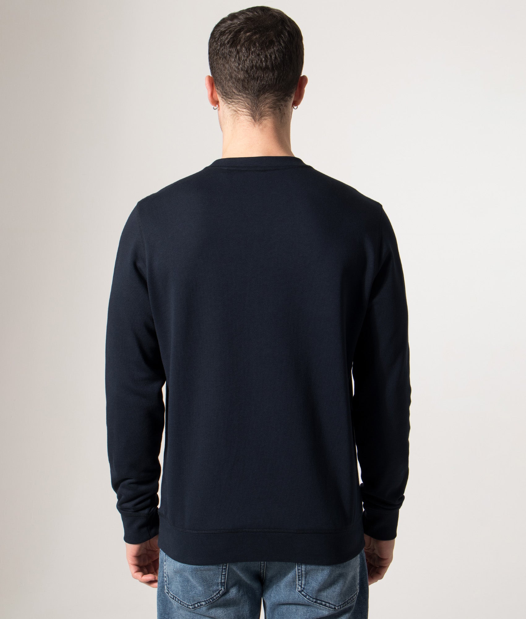 BOSS Relaxed Fit Westart Sweatshirt in Dark Blue at EQVVS Menswear. Model back shot.