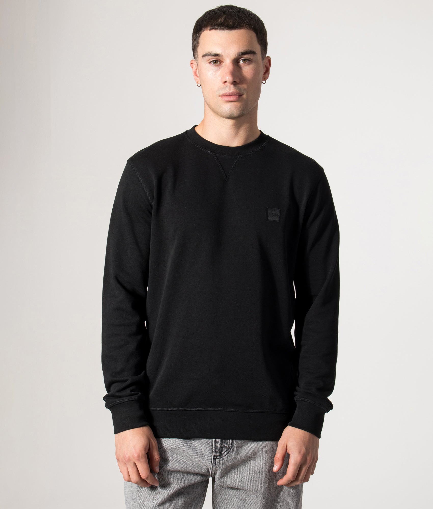 BOSS Relaxed Fit Westart in Black at EQVVS Menswear. Model front shot.