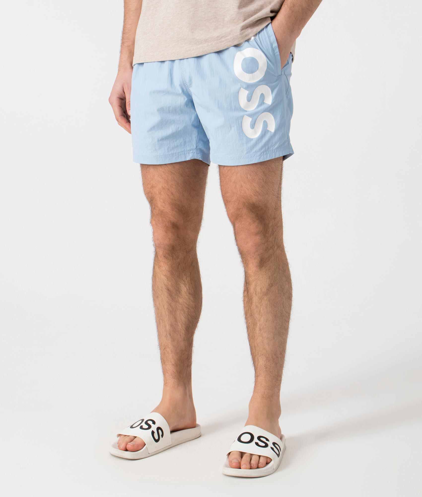 BOSS Octopus Swim Shorts in Light/Pastel Blue. Side angle shot at EQVVS