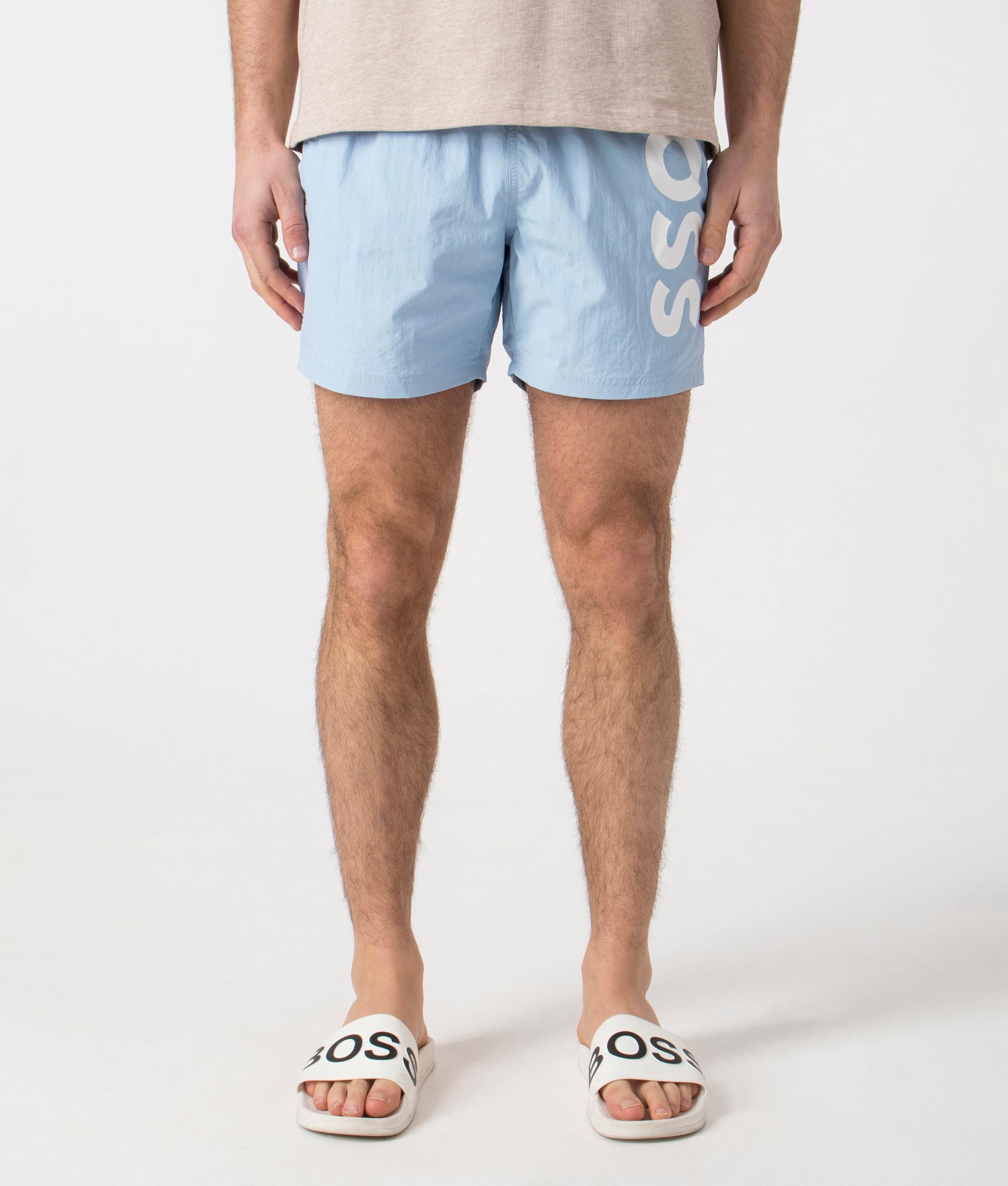 BOSS Octopus Swim Shorts in Light/Pastel Blue. Front angle shot at EQVVS