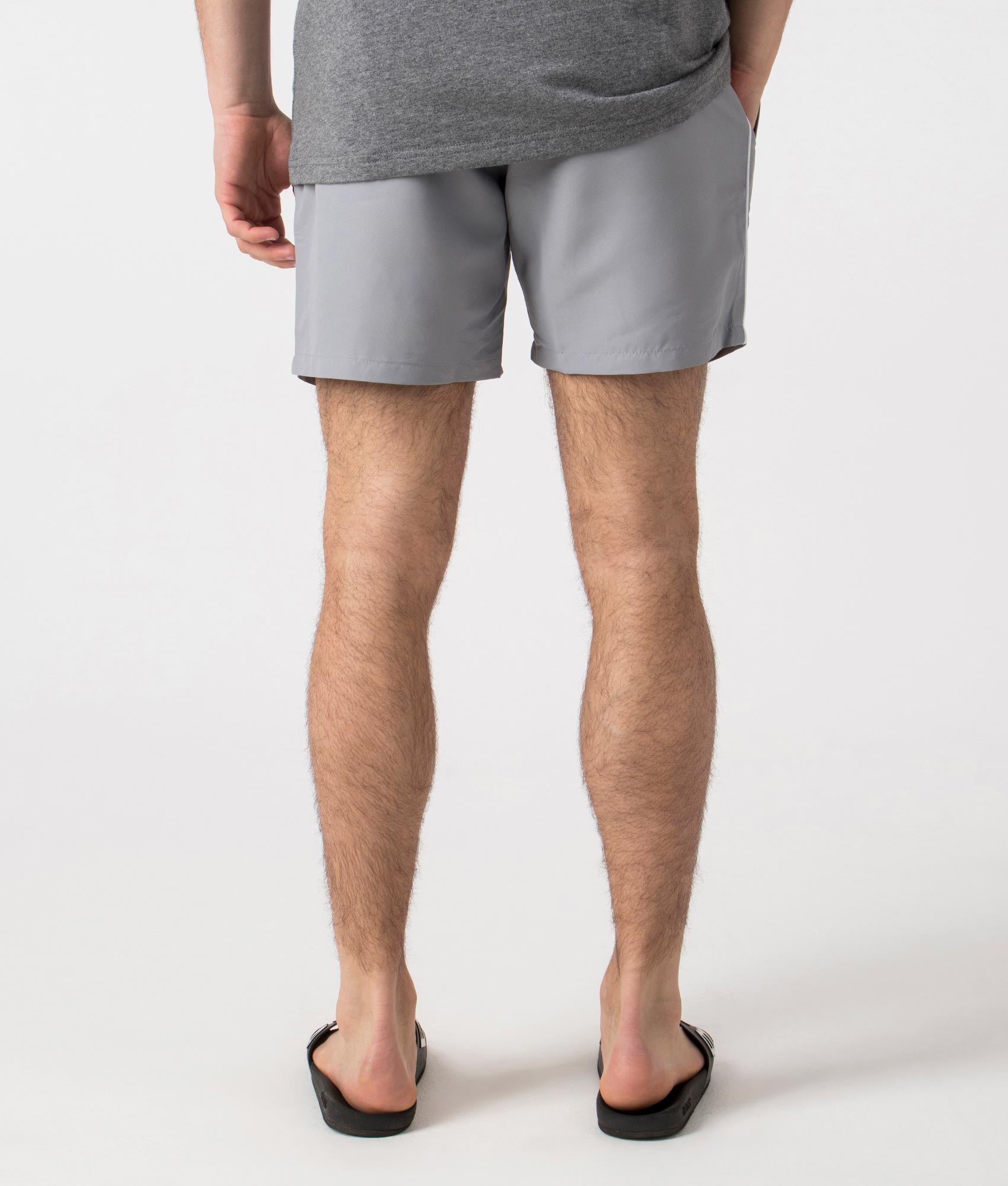 BOSS Starfish Swim Shorts in Silver. Back angle shot at EQVVS.