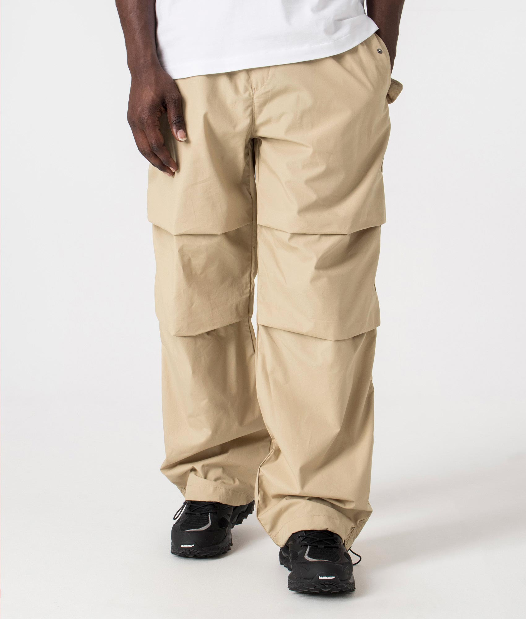 Genet242 Parachute Pants in Medium Beige by HUGO. EQVVS Front Angle Shot.