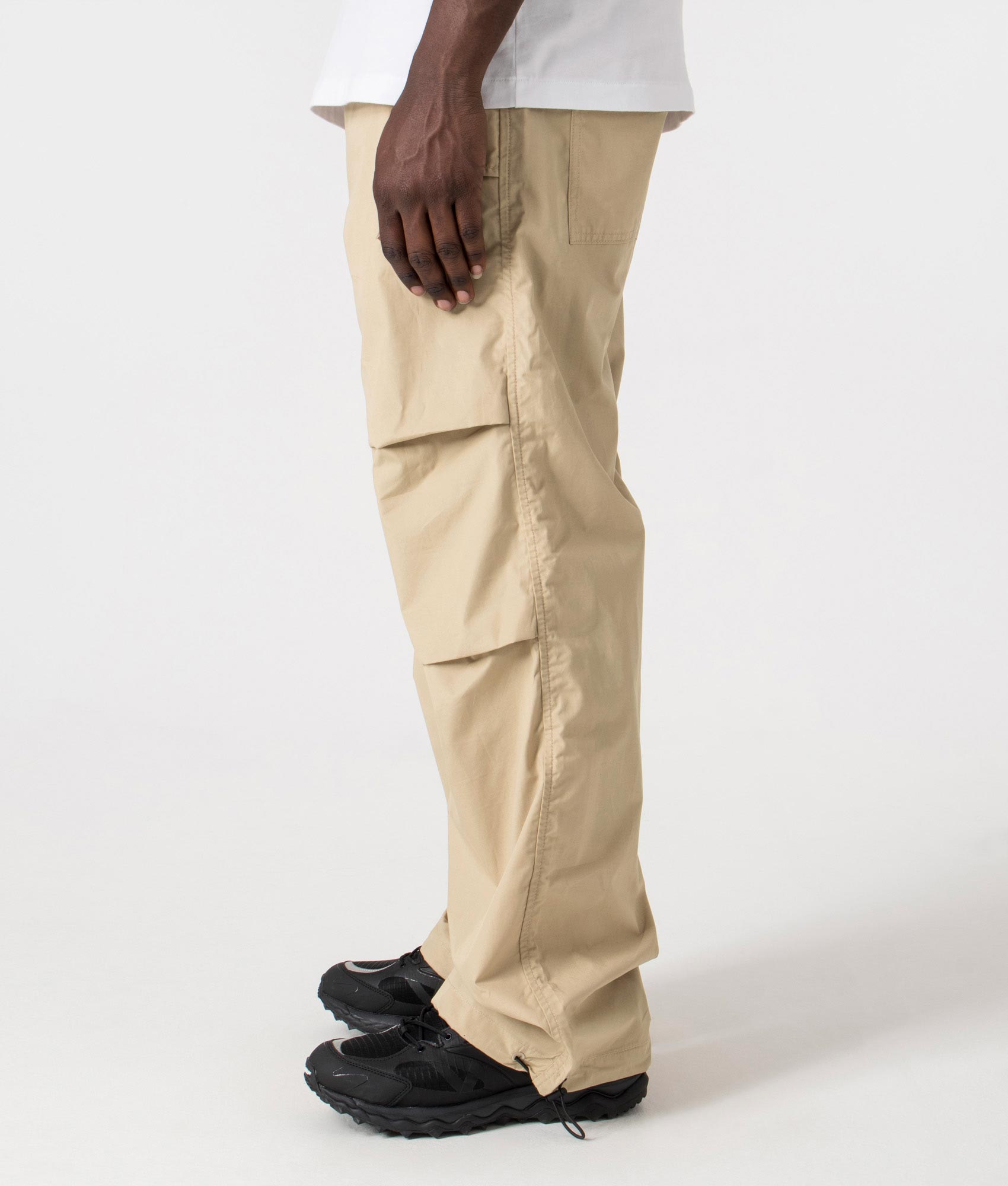 Genet242 Parachute Pants in Medium Beige by HUGO. EQVVS Side Angle Shot.