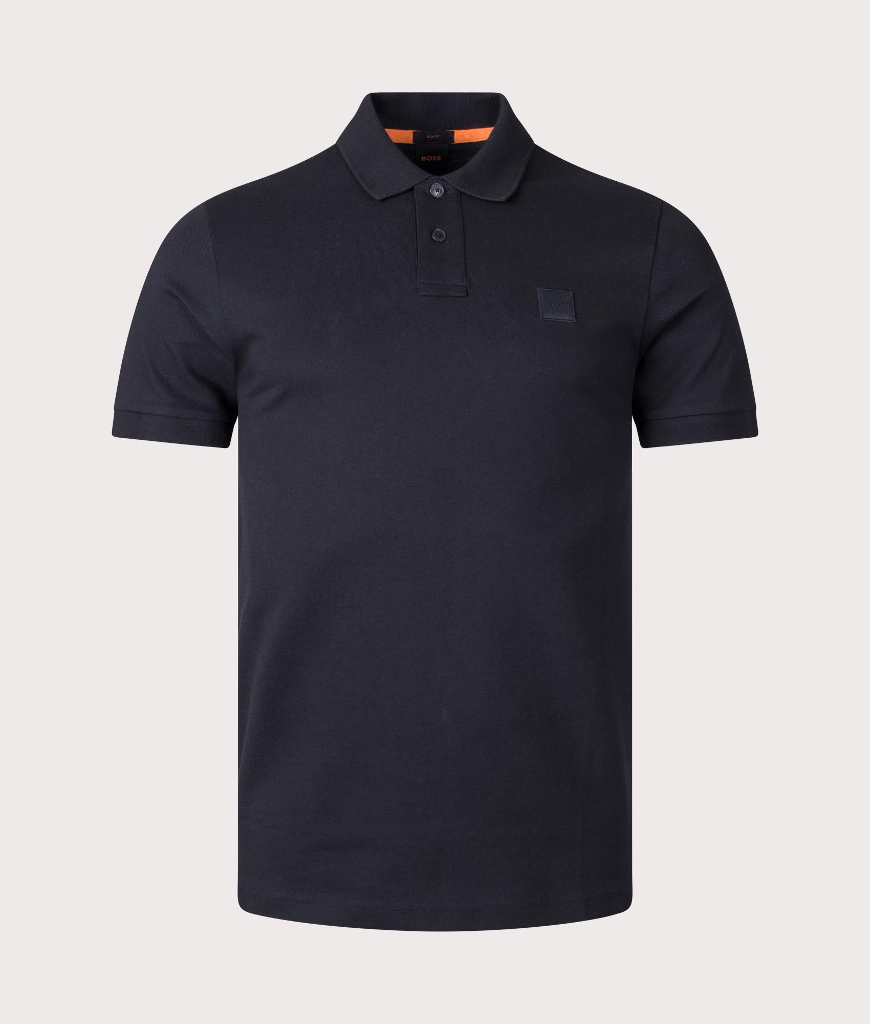 Boss Slim fit Passenger Polo Shirt in Black at EQVVS Menswear. Front shot.