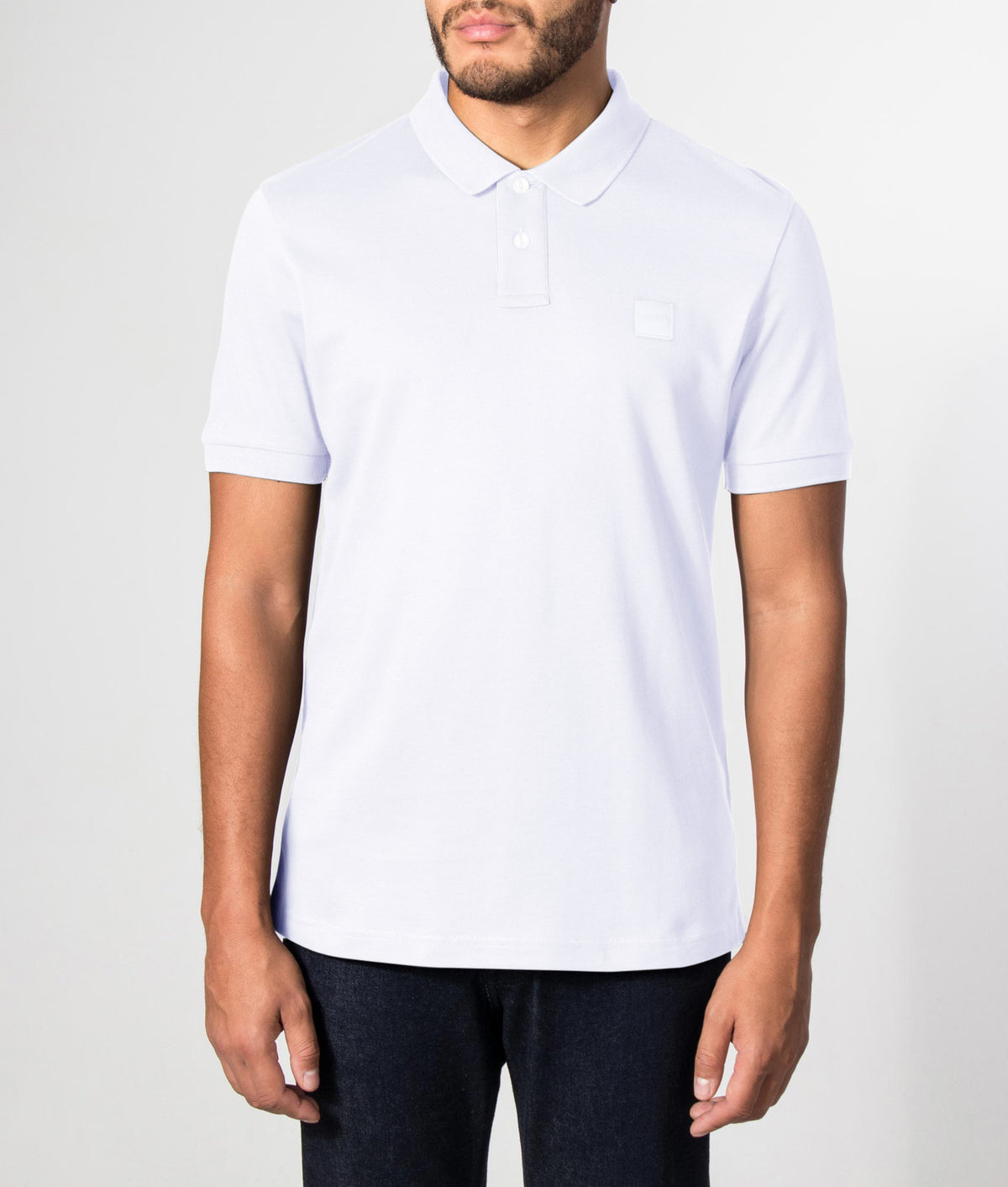 BOSS Slim Fit Passenger Polo Shirt in White Front model shot EQVVS