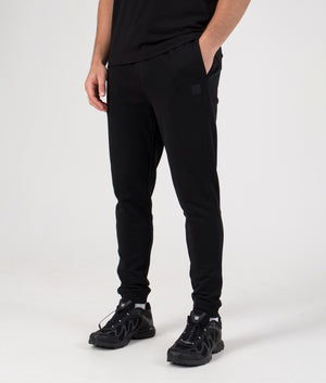 Regular Fit Sestart Joggers in Black | 100% Cotton | BOSS | EQVVS | Front angle model shot