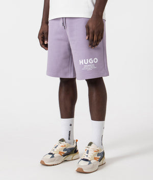 HUGO Relaxed Fit Nomario Sweat Shorts in 541 open purple side front shot at EQVVS