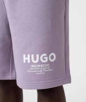 HUGO Relaxed Fit Nomario Sweat Shorts in 541 open purple Detail shot at EQVVS