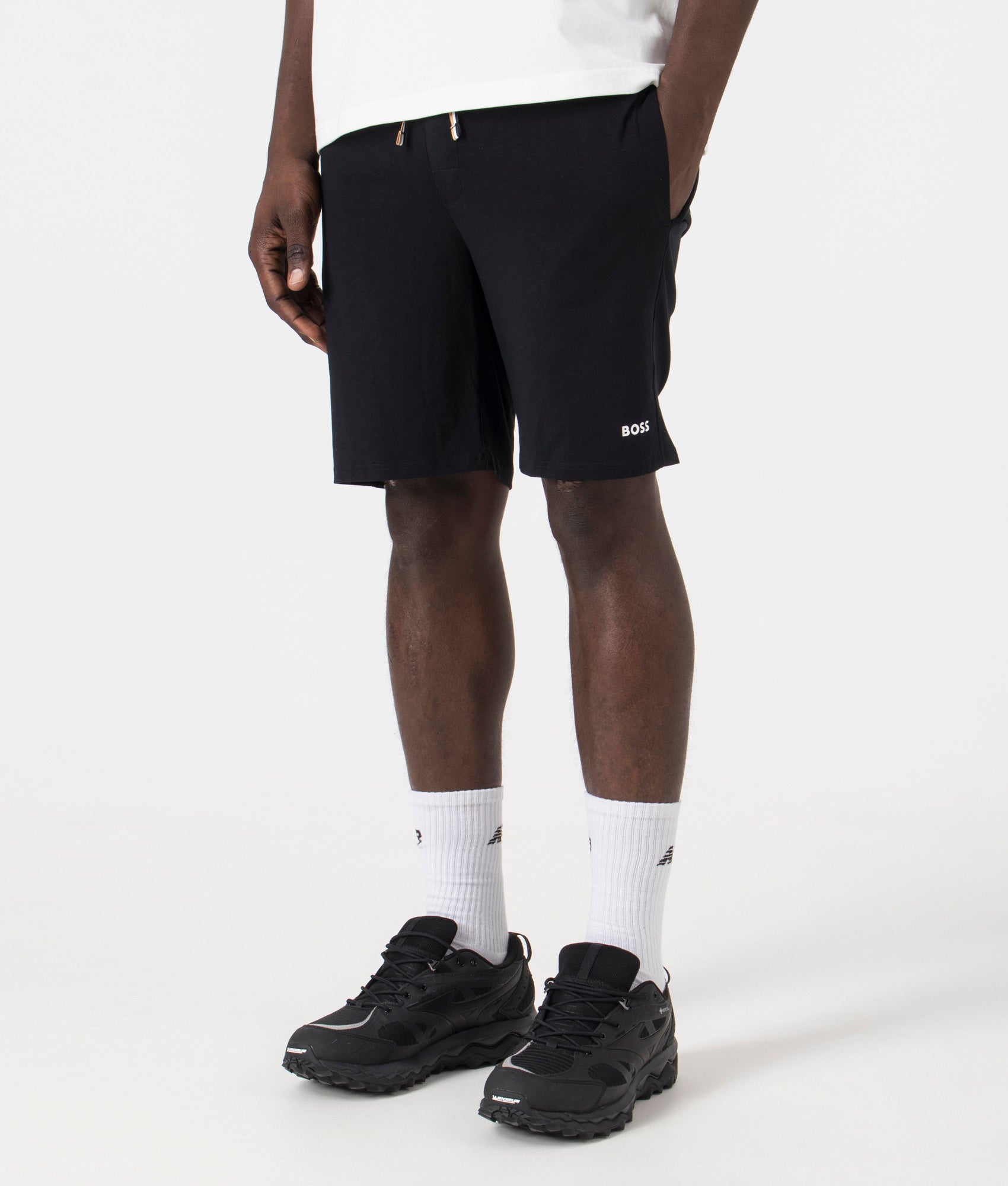 Lightweight Unique Shorts in Black by BOSS. EQVVS Model Shot. 
