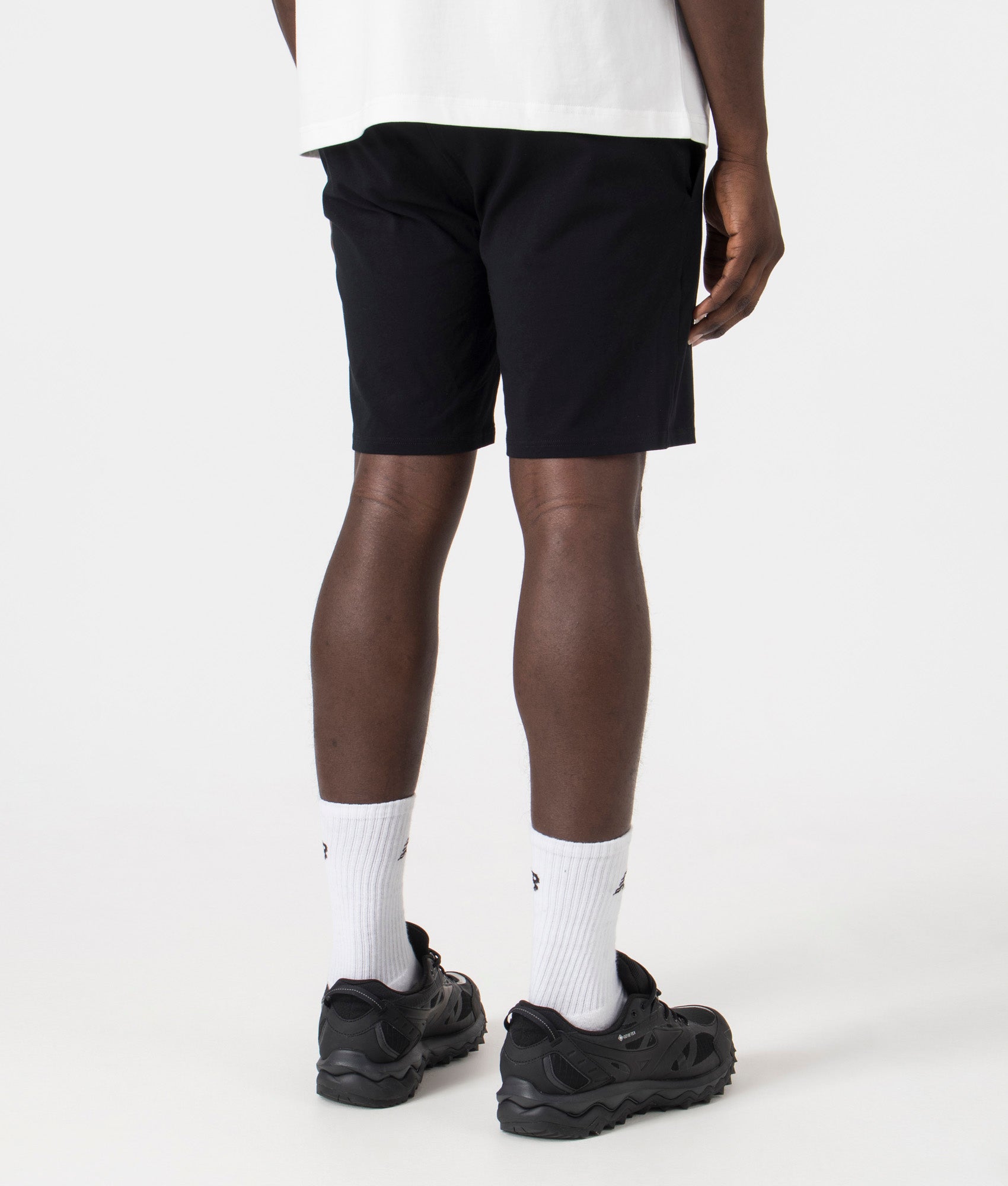 Lightweight Unique Shorts in Black by BOSS. EQVVS Model Shot.