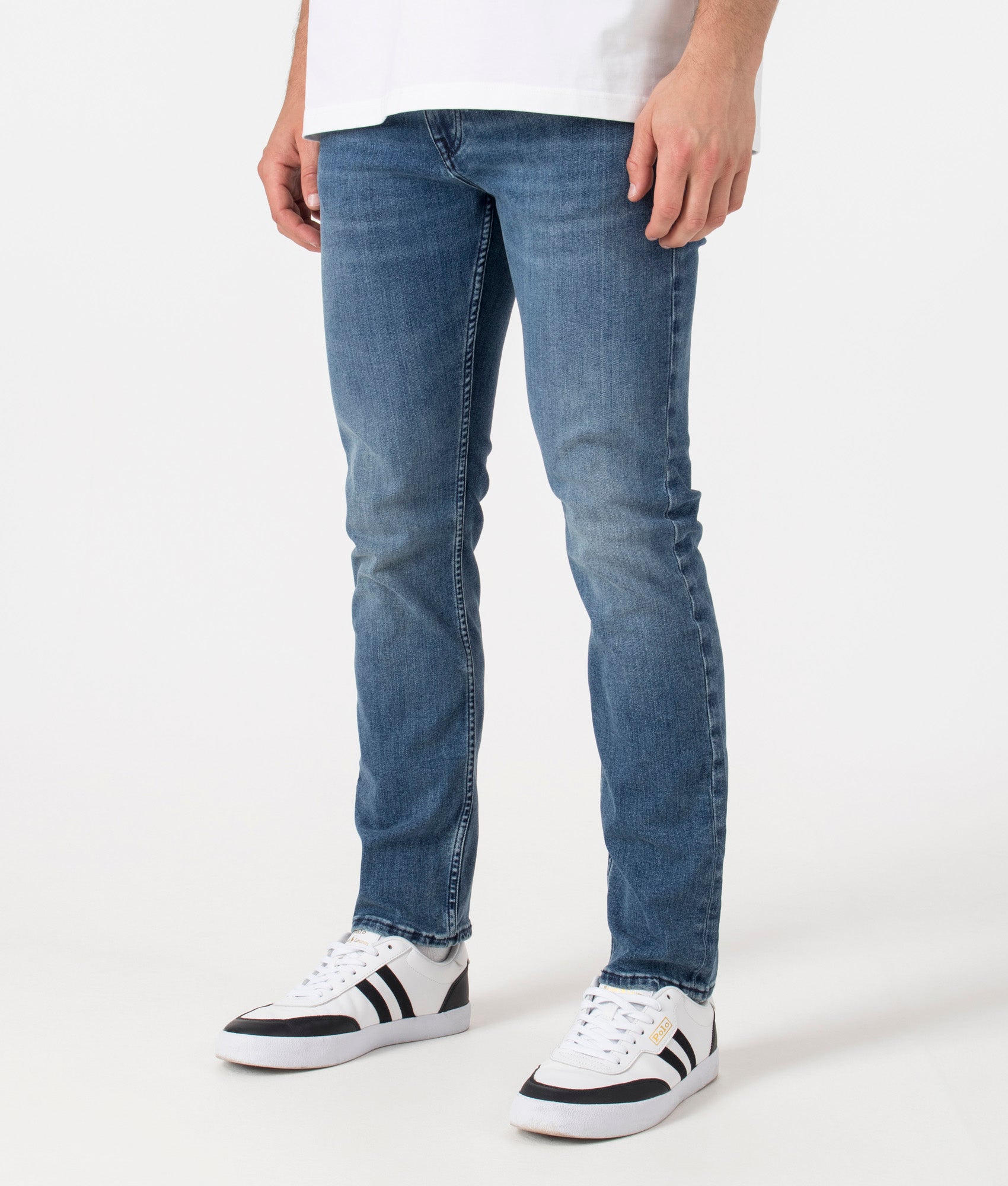 BOSS Slim Fit Delaware BC-P Jeans in Bright Blue. Front Angle model shot at EQVVS.