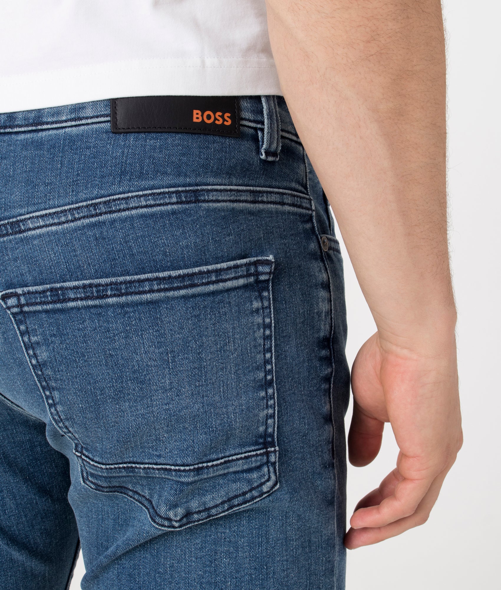 BOSS Slim Fit Delaware BC-P Jeans in Bright Blue. Pocket Detail model shot at EQVVS.