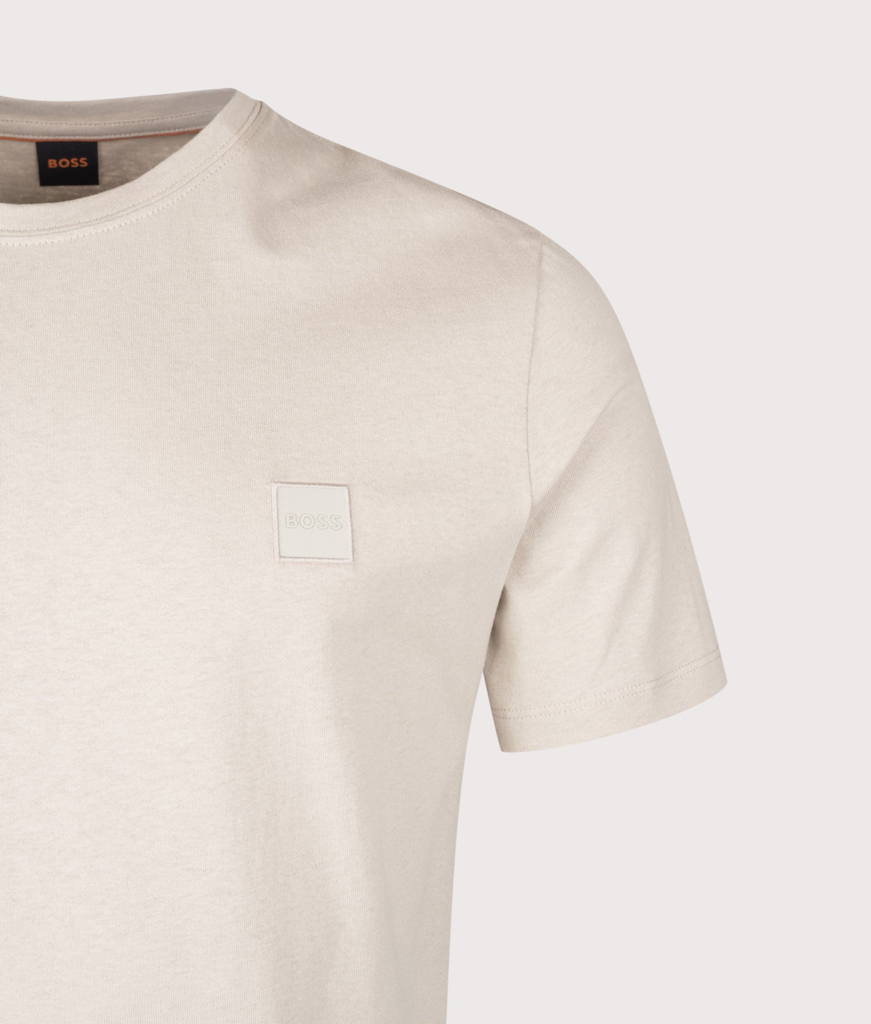 BOSS Regular Fit Tales T-Shirt in Light Beige at EQVVS Menswear. Detail shot.