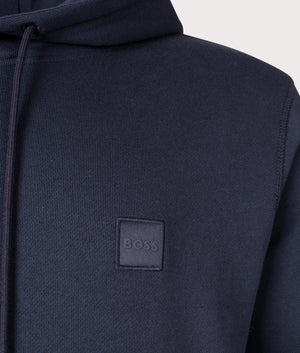 Boss Orange Wetalk Hoodie in 404 dark blue with patch logo detail shot at EQVVS