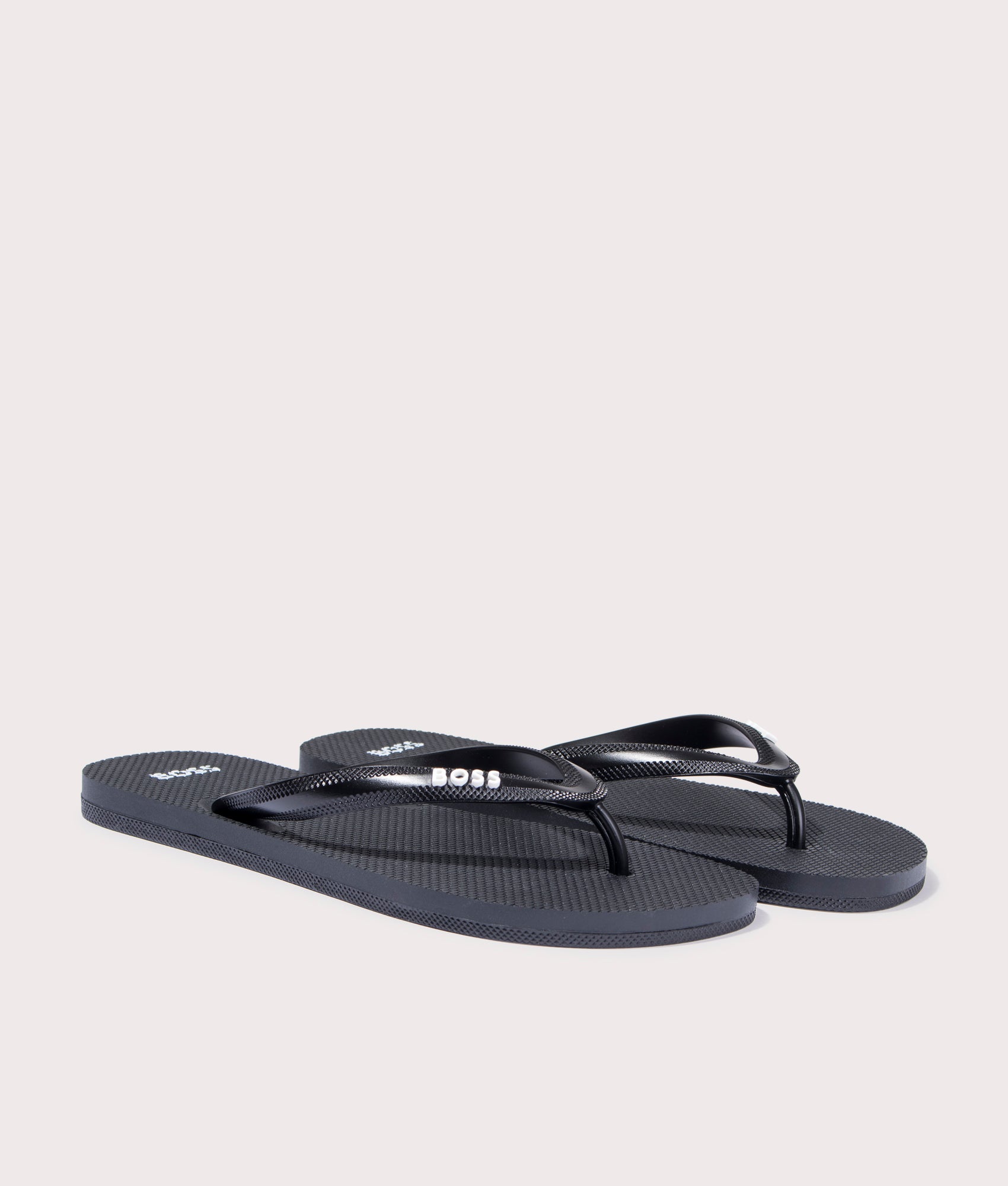 BOSS Tracy Flip Flops in Black. Front angle shot at EQVVS.