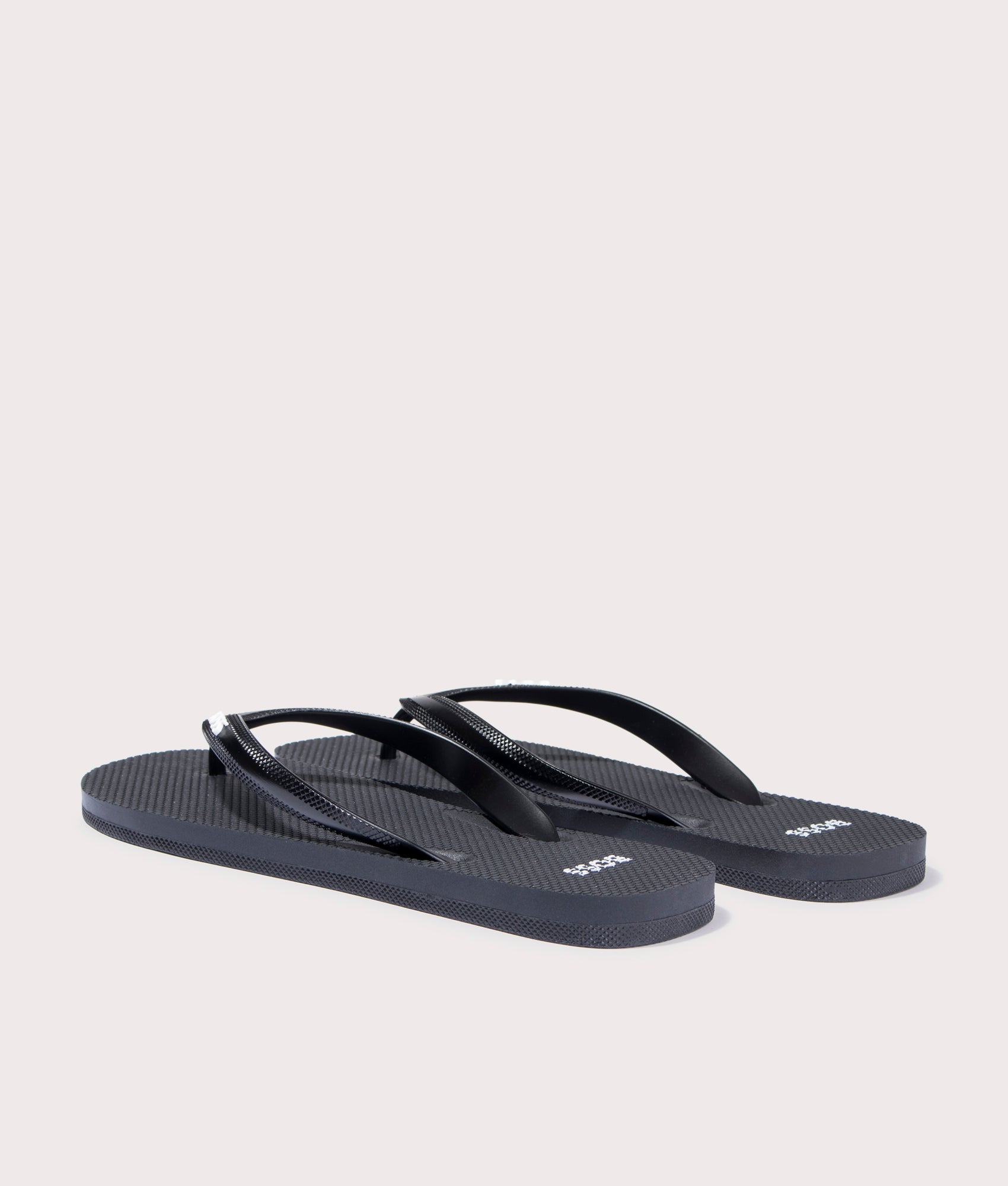 BOSS Tracy Flip Flops in Black. Back angle shot at EQVVS.