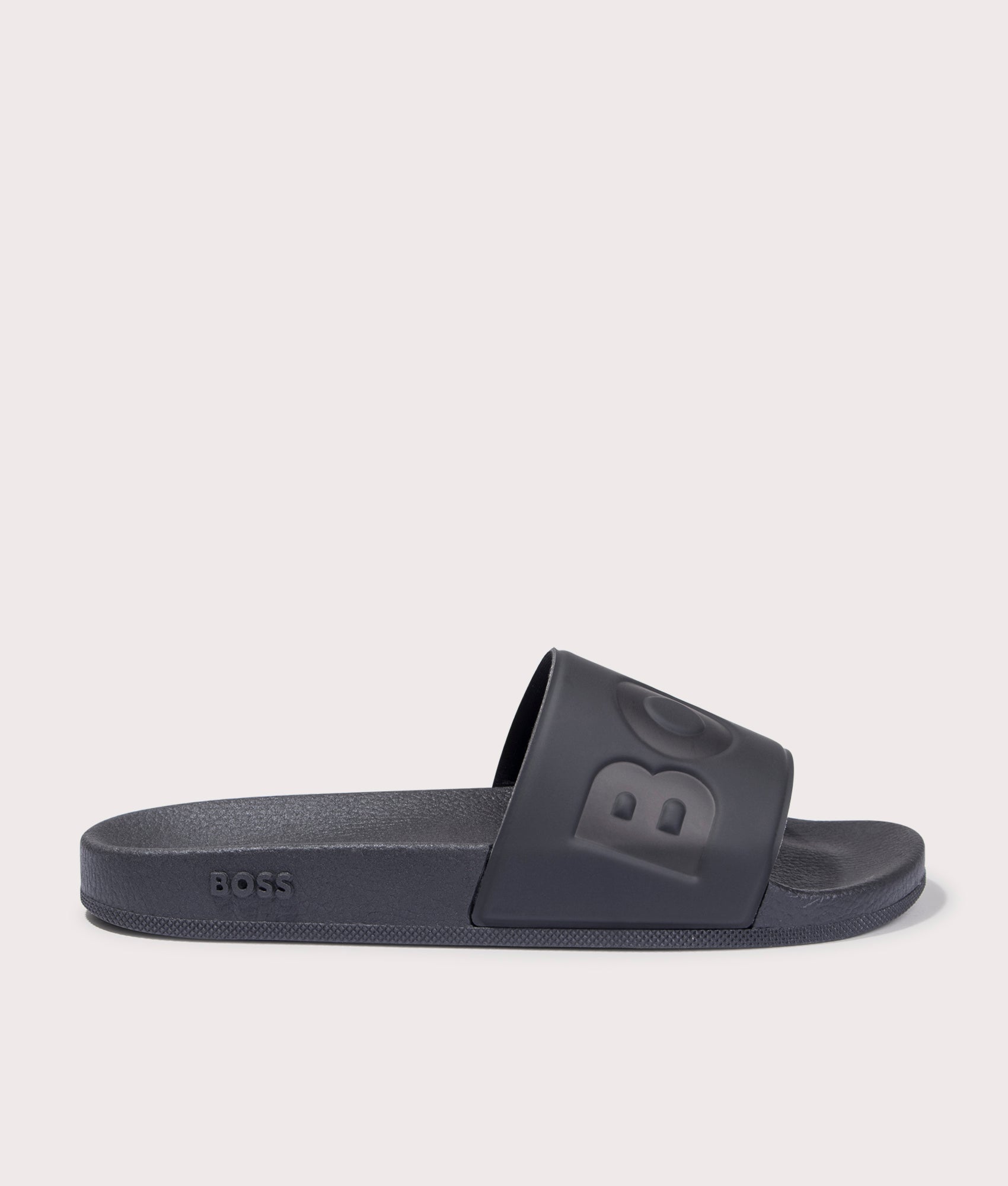 BOSS Aryeh Sliders in Black. Side angle shot at EQVVS.