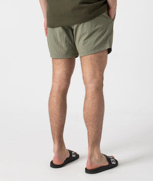 BOSS Octopus Swim Shorts in Beige/Khaki. Back angle shot at EQVVS.