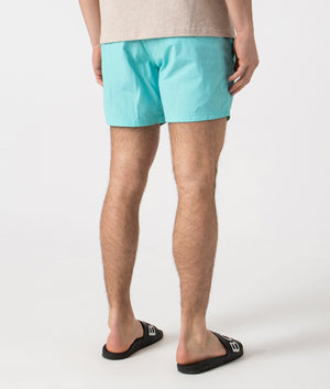 BOSS Octopus Swim Shorts in Turquoise/Aqua. Back angle shot at EQVVS.