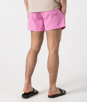 HUGO ABAS Lined Swim Shorts in Medium Pink. Back angle shot at EQVVS.