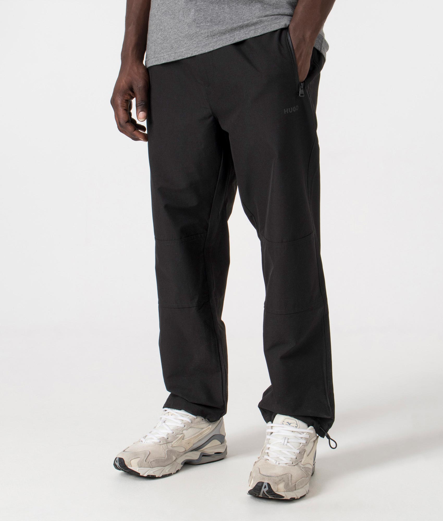 Gendo242 Parachute Pants in Black by HUGO. EQVVS Side Angle Shot