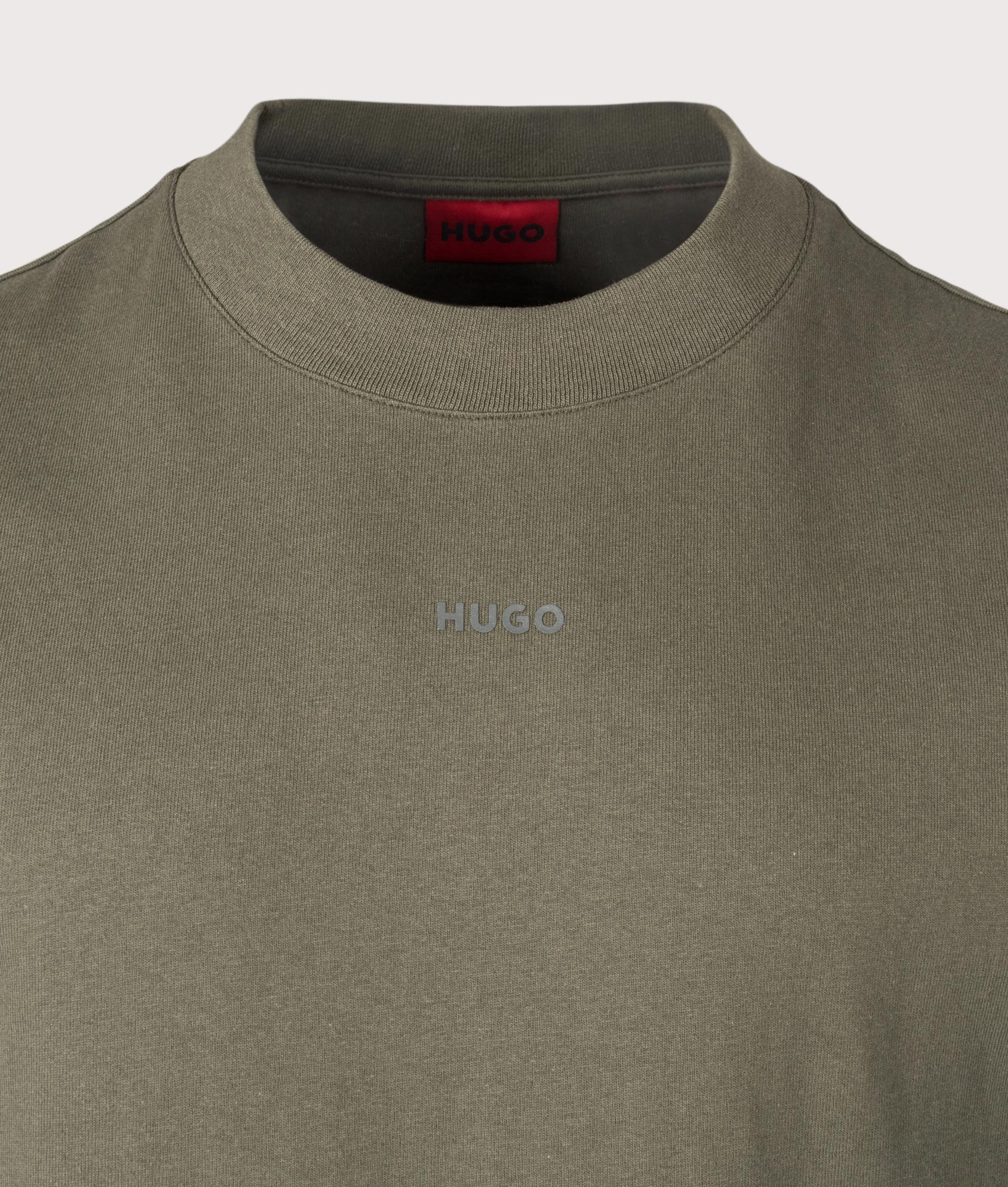 HUGO Relaxed Fit Dapolino T-Shirt in Dark Beige. Detail angle shot at EQVVS.