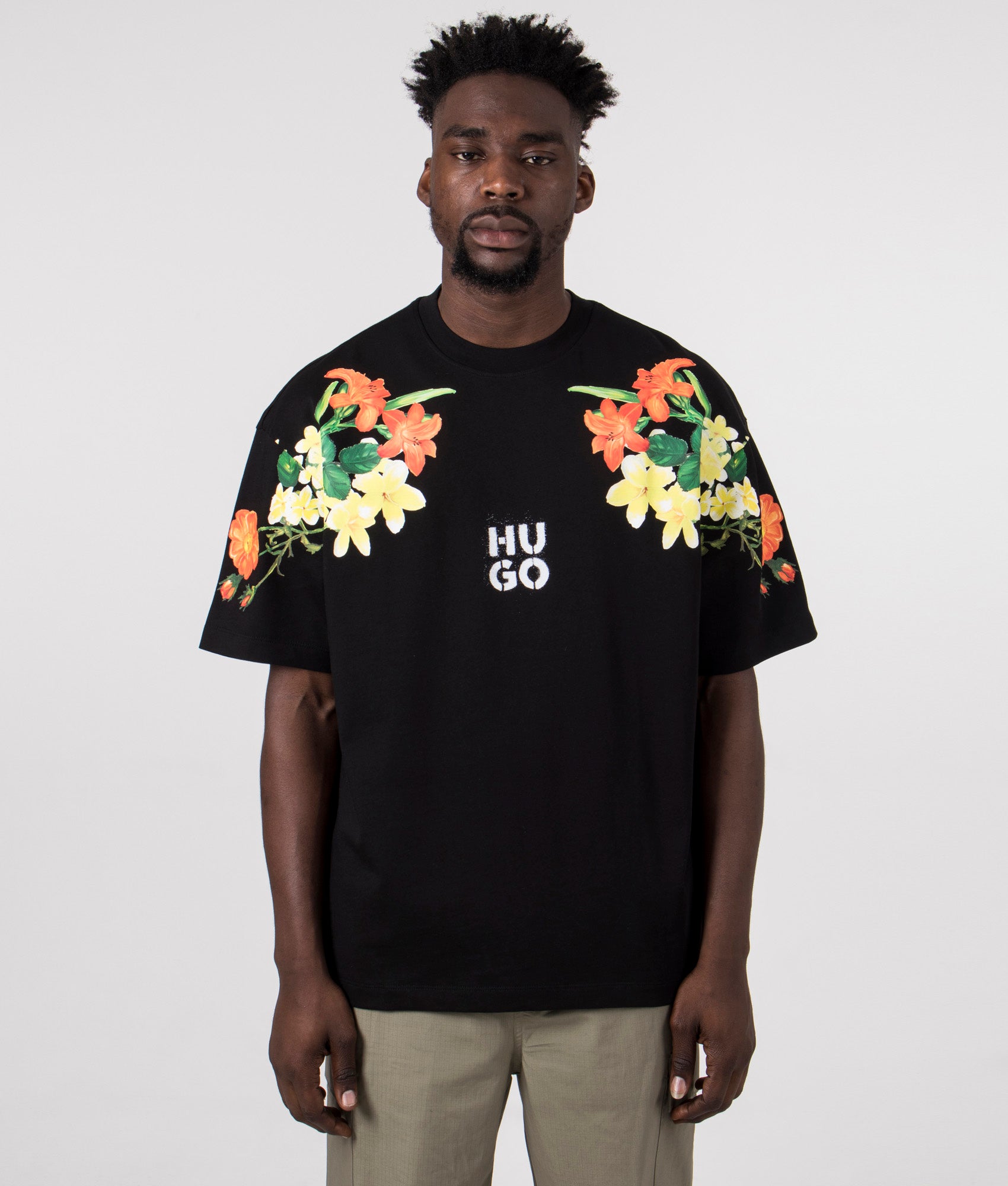 Relaxed Fit Diblostee T-Shirt in Black by Hugo. EQVVS Model Shot. 