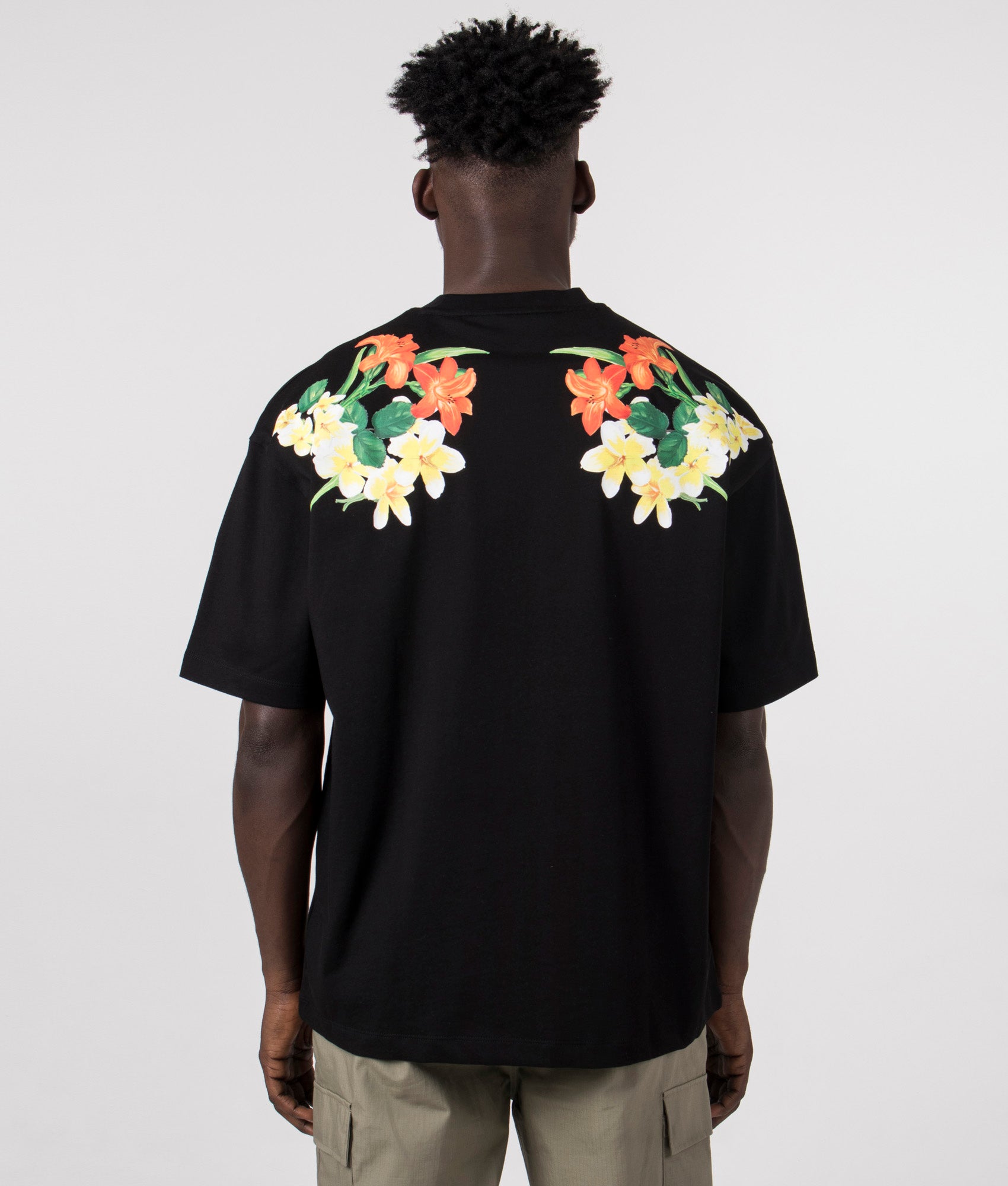 Relaxed Fit Diblostee T-Shirt in Black by Hugo. EQVVS Model Shot.
