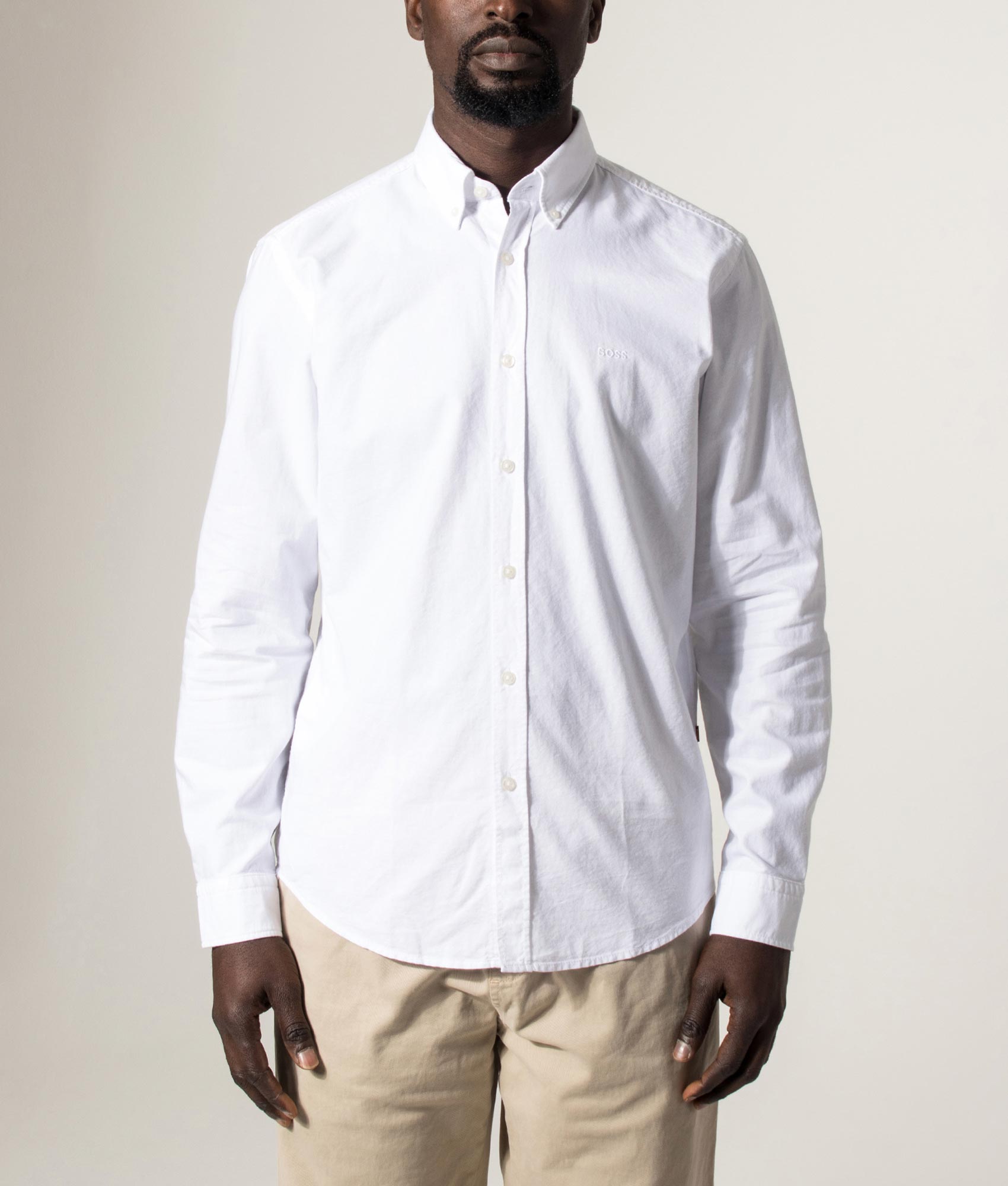 BOSS Rickert M Shirt in White at EQVVS  Menswear. Model front shot.