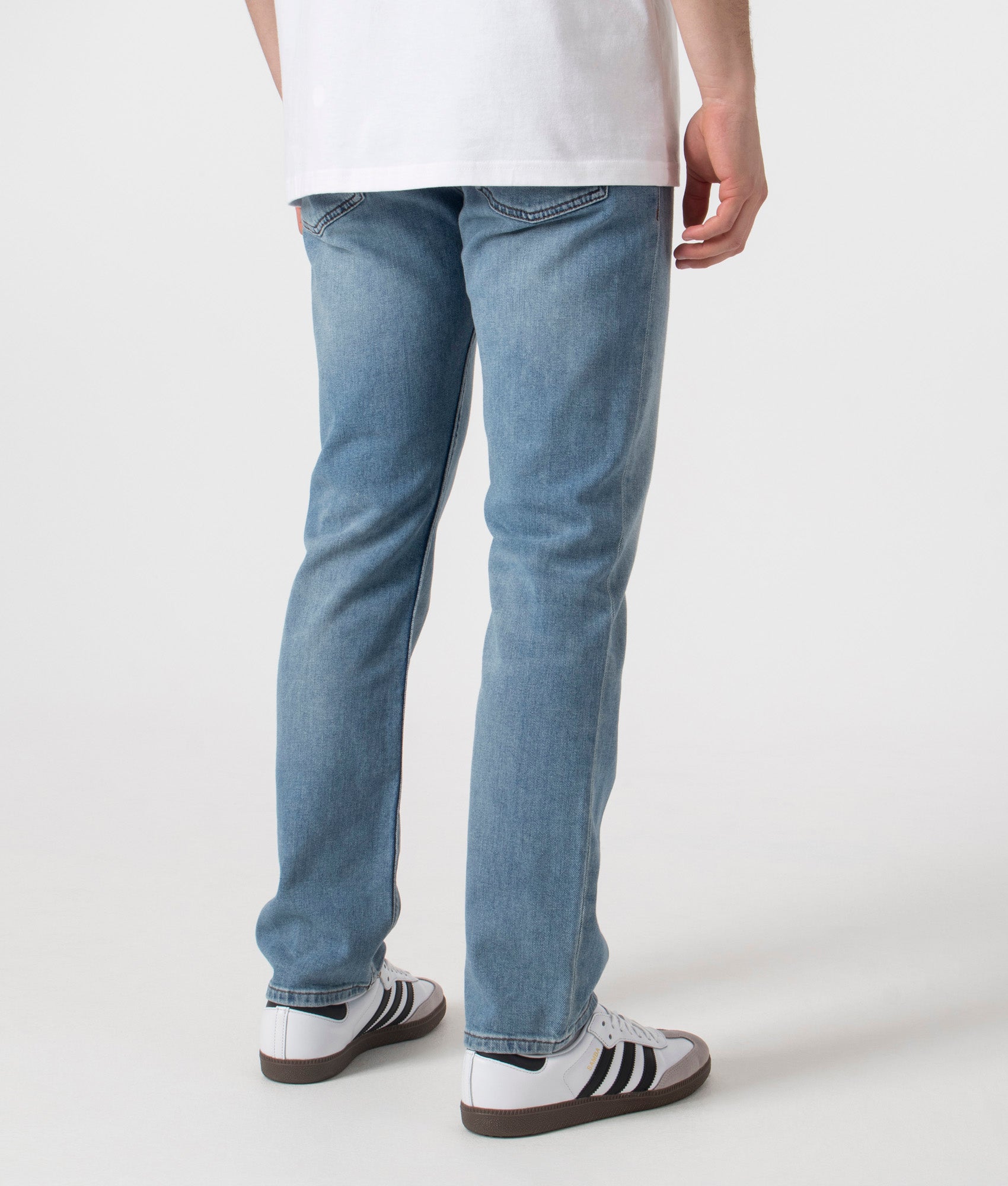 BOSS Delaware Jeans in Bright Blue at EQVVS Menswear. Angled back shot.