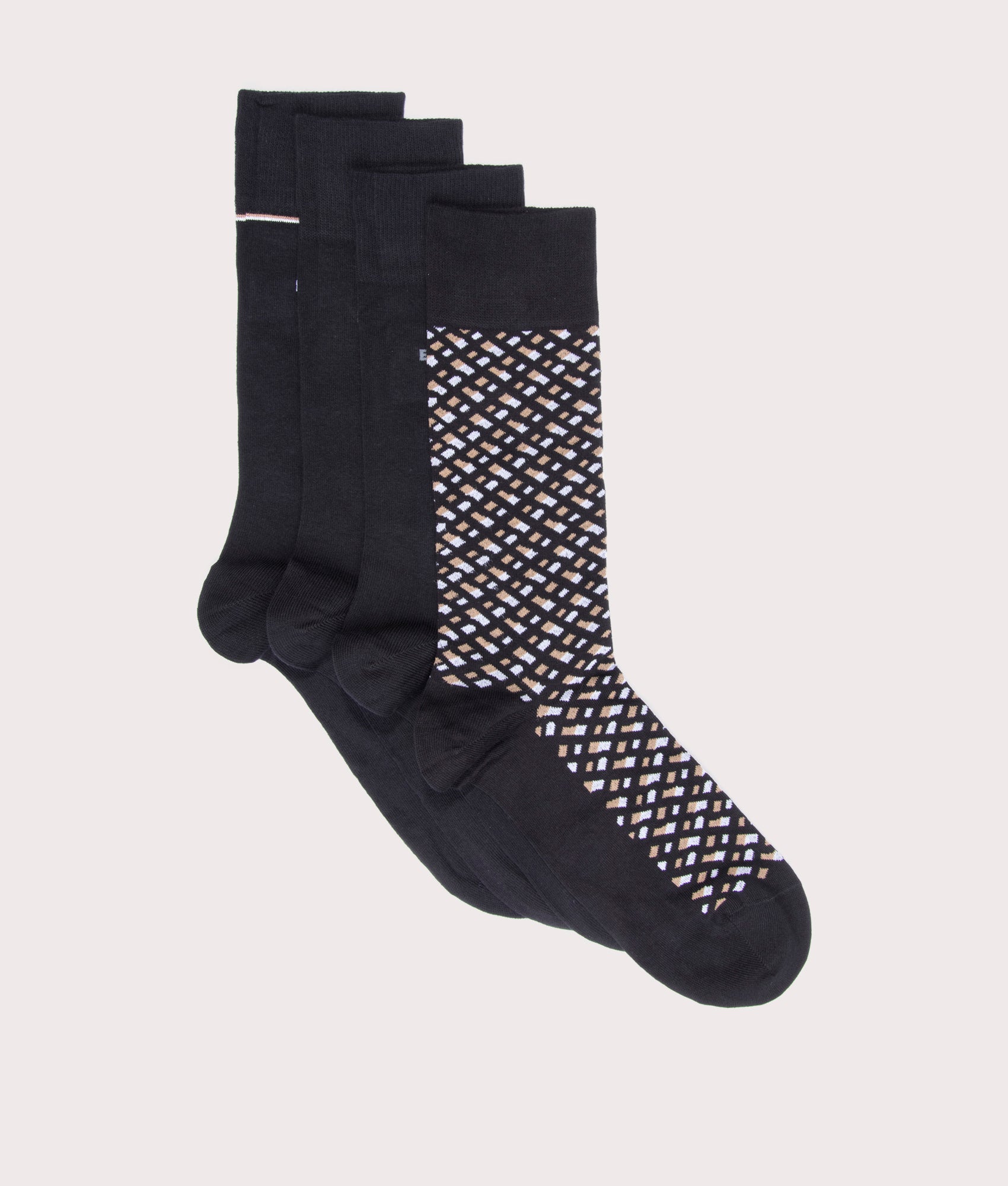 BOSS 4 Pack RS Monogrammed Socks in Black with Beige and White details at EQVVS Menswear. Front shot.