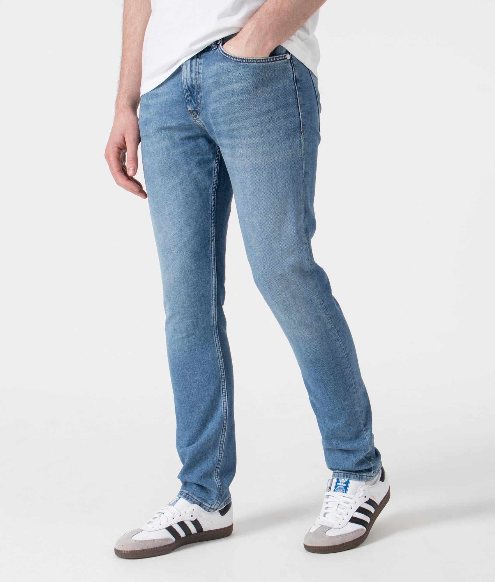 BOSS Slim Fit Delaware Jeans in Bright Blue . Shot at EQVVS. Front angle shot 