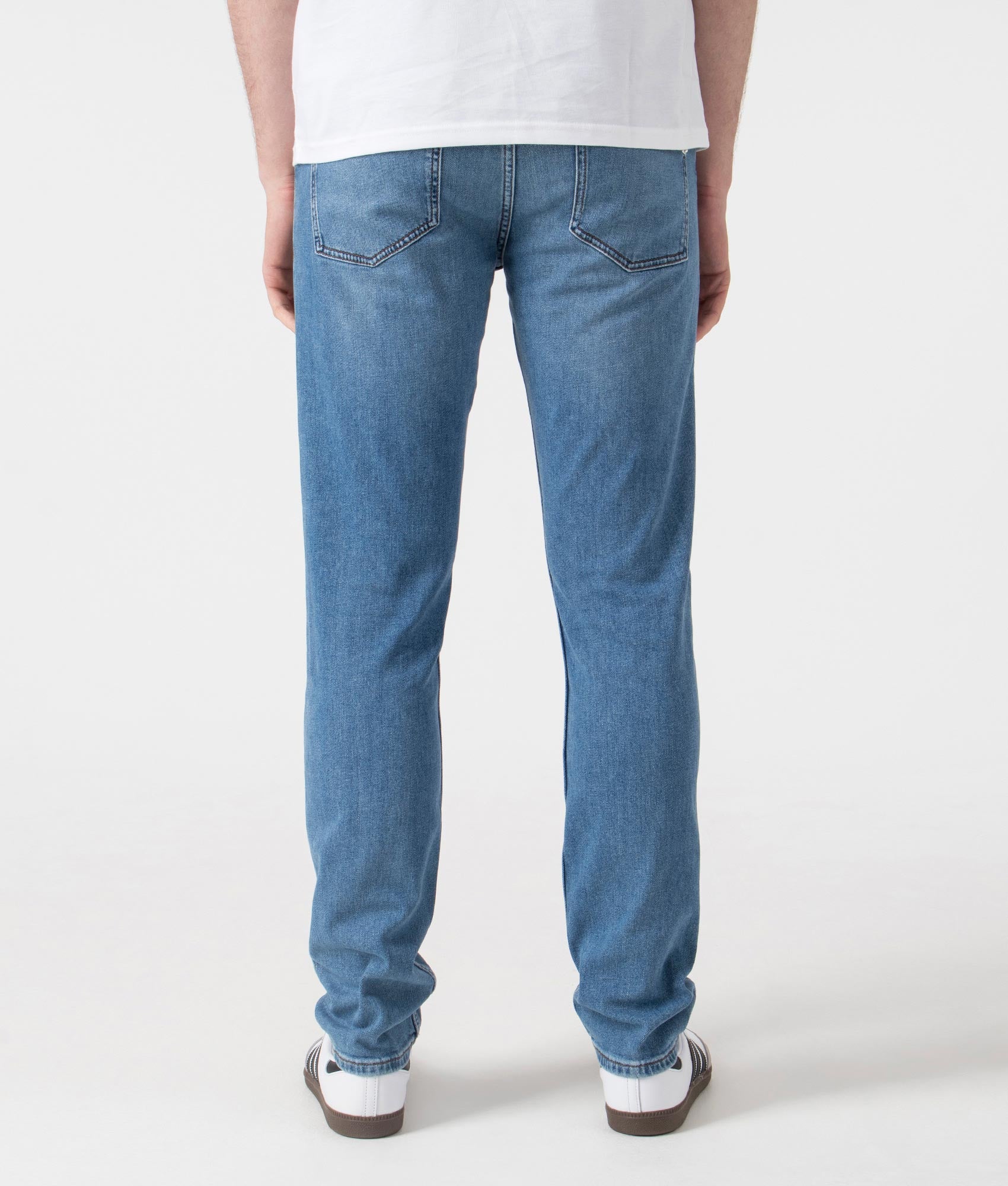 BOSS Slim Fit Delaware Jeans in Bright Blue . Shot at EQVVS. Back shot 
