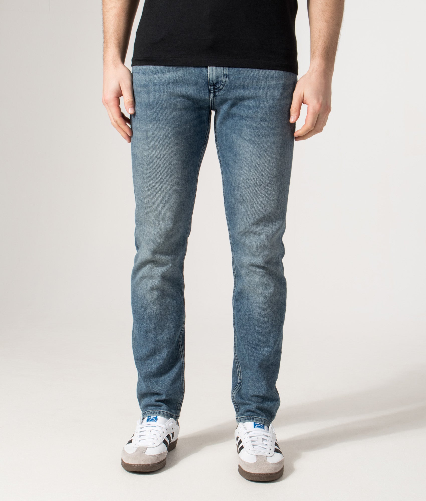 Slim Fit Delaware Jeans in Medium Blue | EQVVS | Front model shot 
