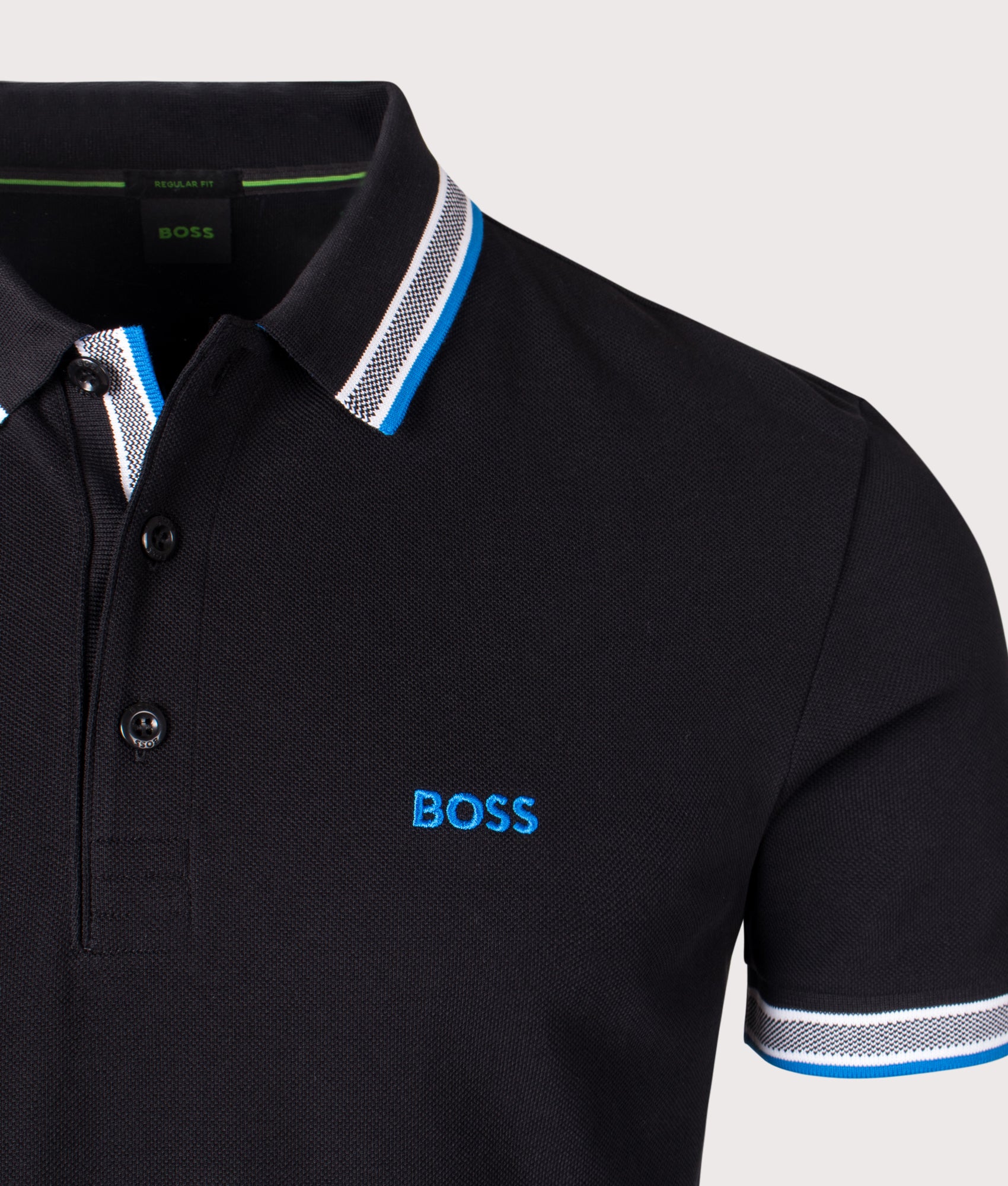 Paddy Polo Shirt in Black by BOSS. EQVVS Shot.